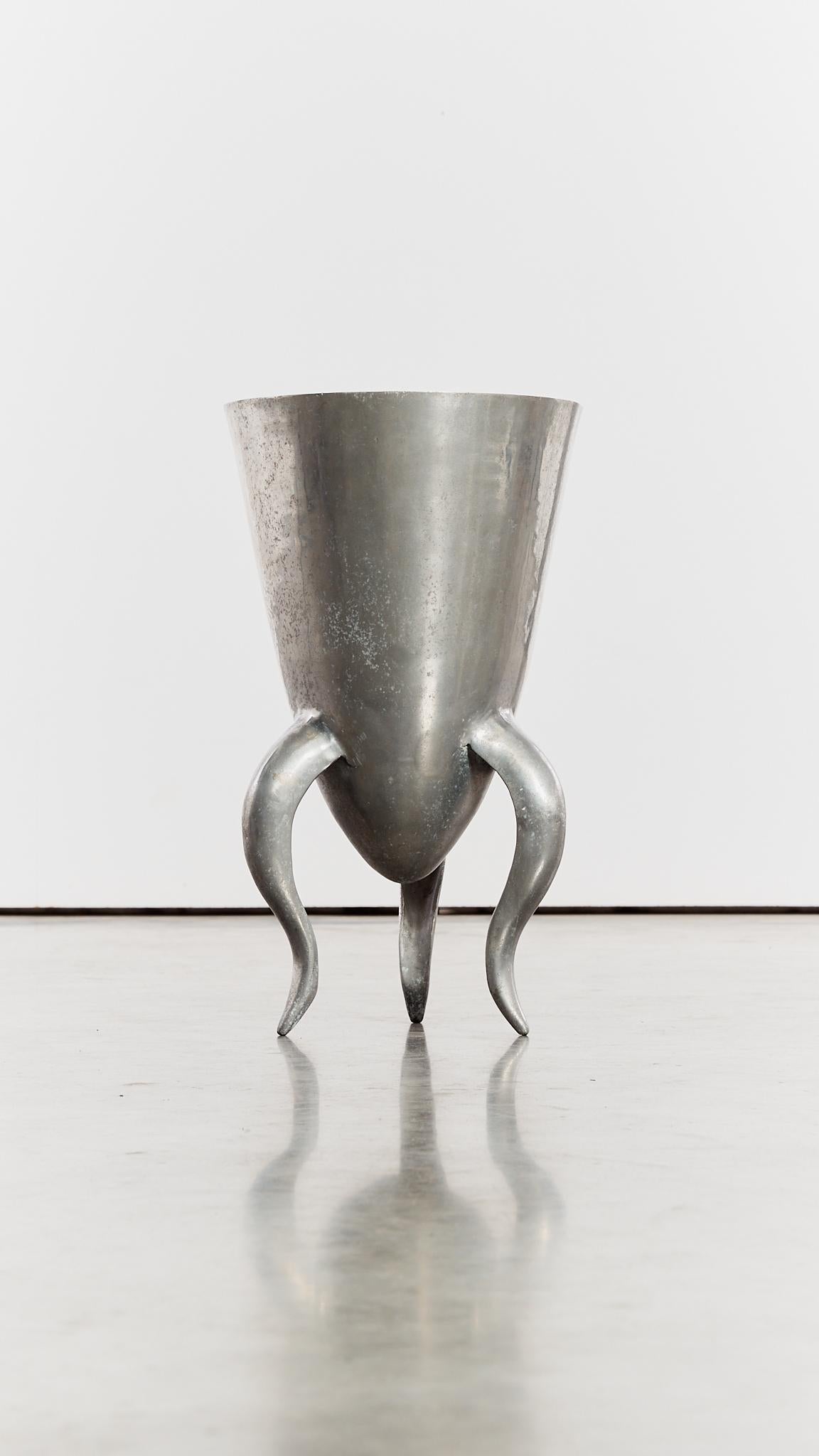 Late 20th Century Aluminium vessel/planter with curved tripod legs For Sale