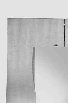 Specchio da parete in alluminio mod "Wave" di Lorenzo Burchiellaro - anni '70