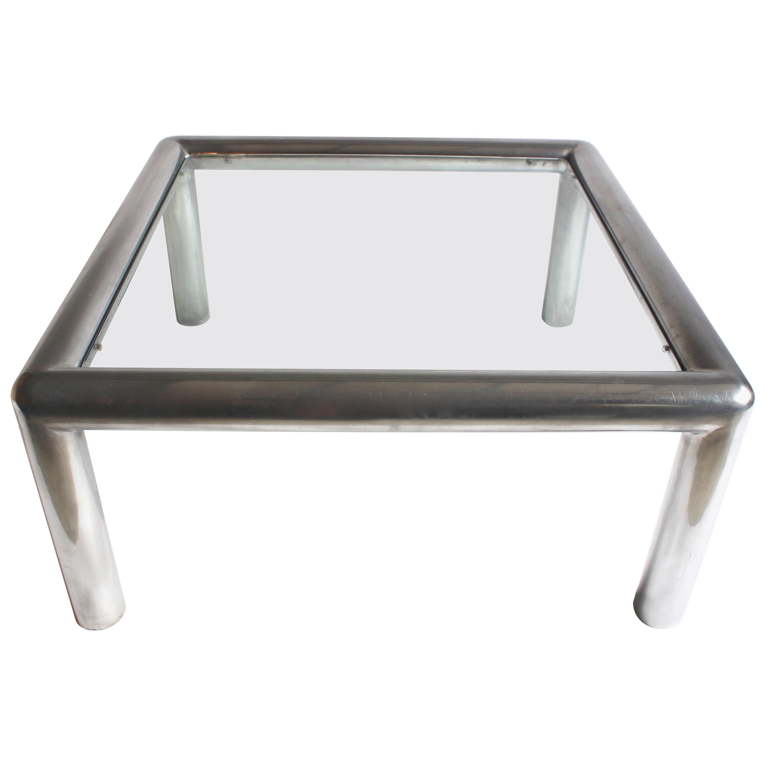 Couchtisch „Tubo“ aus Aluminium und Glas von John Mascheroni