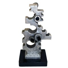 Sculpture de l'ère de la machine en aluminium coulé