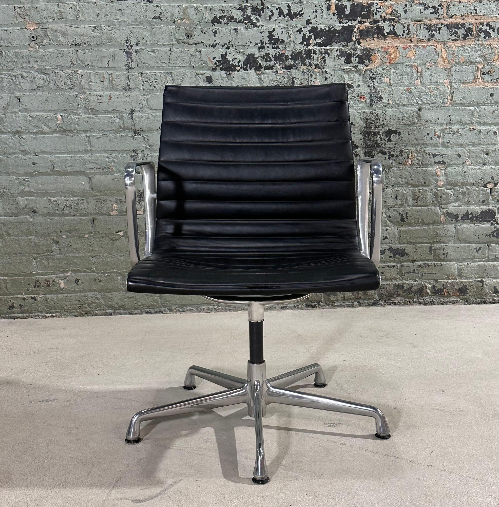 Aluminum Group Desk Chair by Charles Eames for Herman Miller, Signed on bottom.  Black leather with aluminum base.