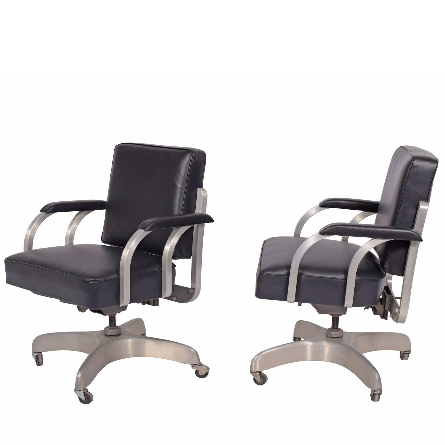 Great American classic office chairs featuring square tube solid aluminium frame and cast aluminium. Base is adjustable in height and has tilt and swivel functionality. New black leather upholstery made by Emaco.