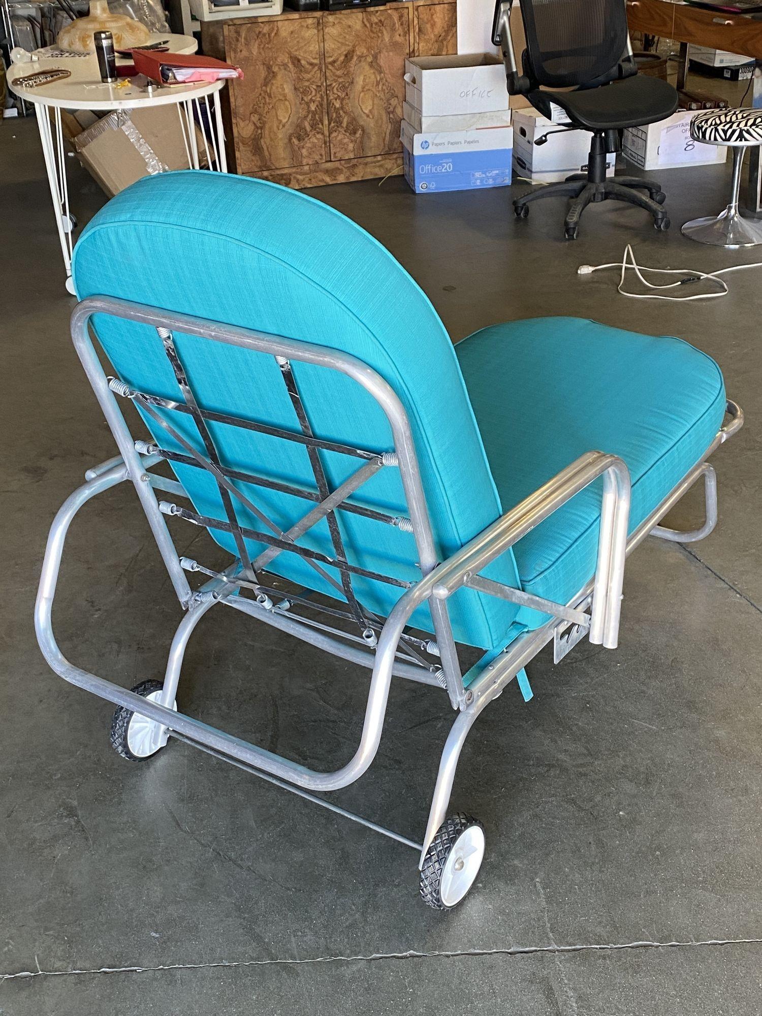 vintage aluminum chaise lounge with wheels