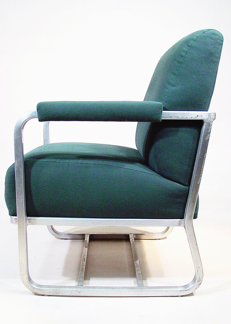 These Art Deco aluminum lounge chairs were acquired from a Pullman passenger train remodeled in the 1960s. The chairs feature tubular aluminum frames and forest-green upholstery.
 
By Emeco, USA 1930.
3-Avalible 