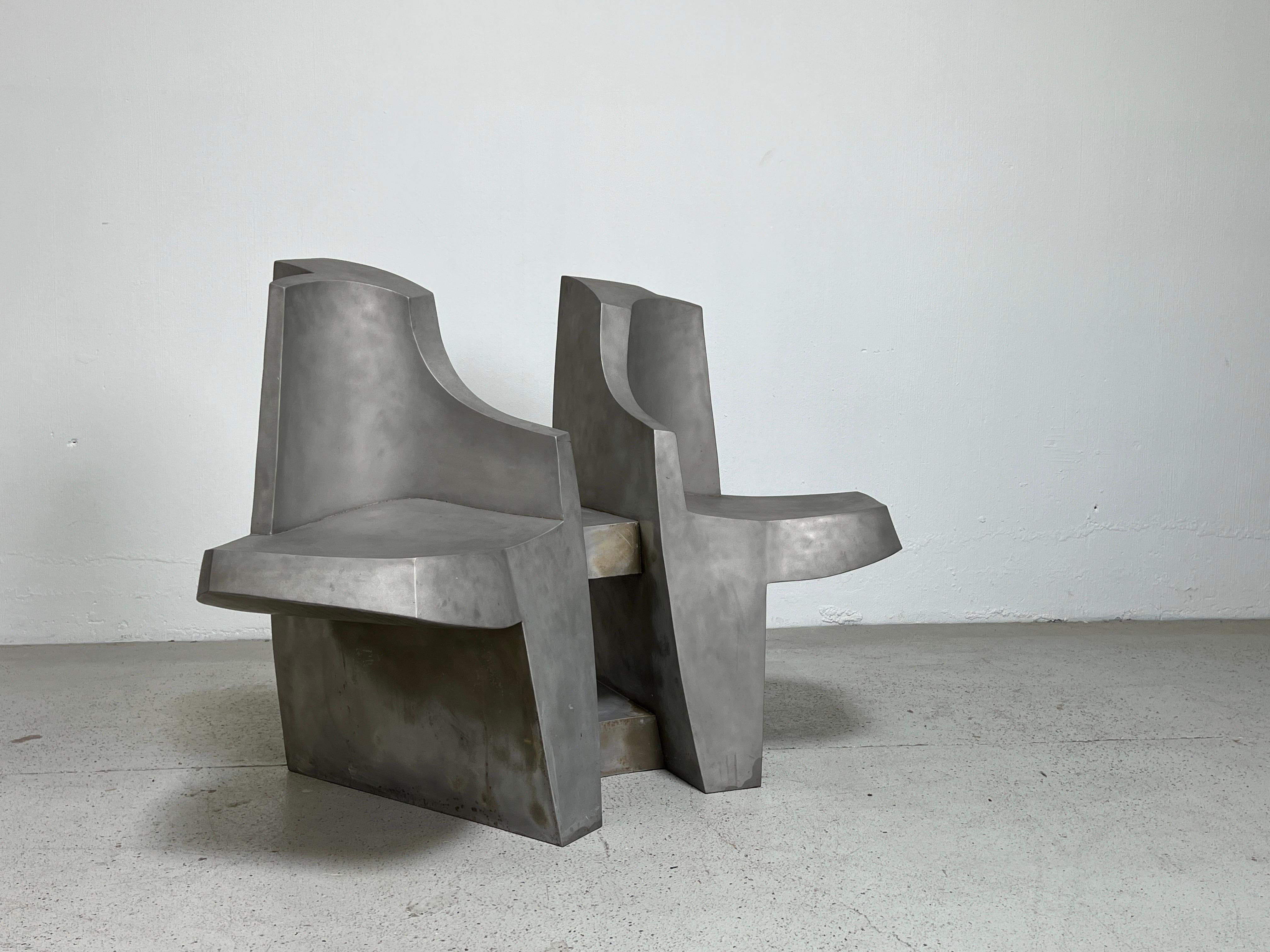 A sculptural aluminum bench made by artist Jim Cole and sold through Art et Industrie, c.1990. 