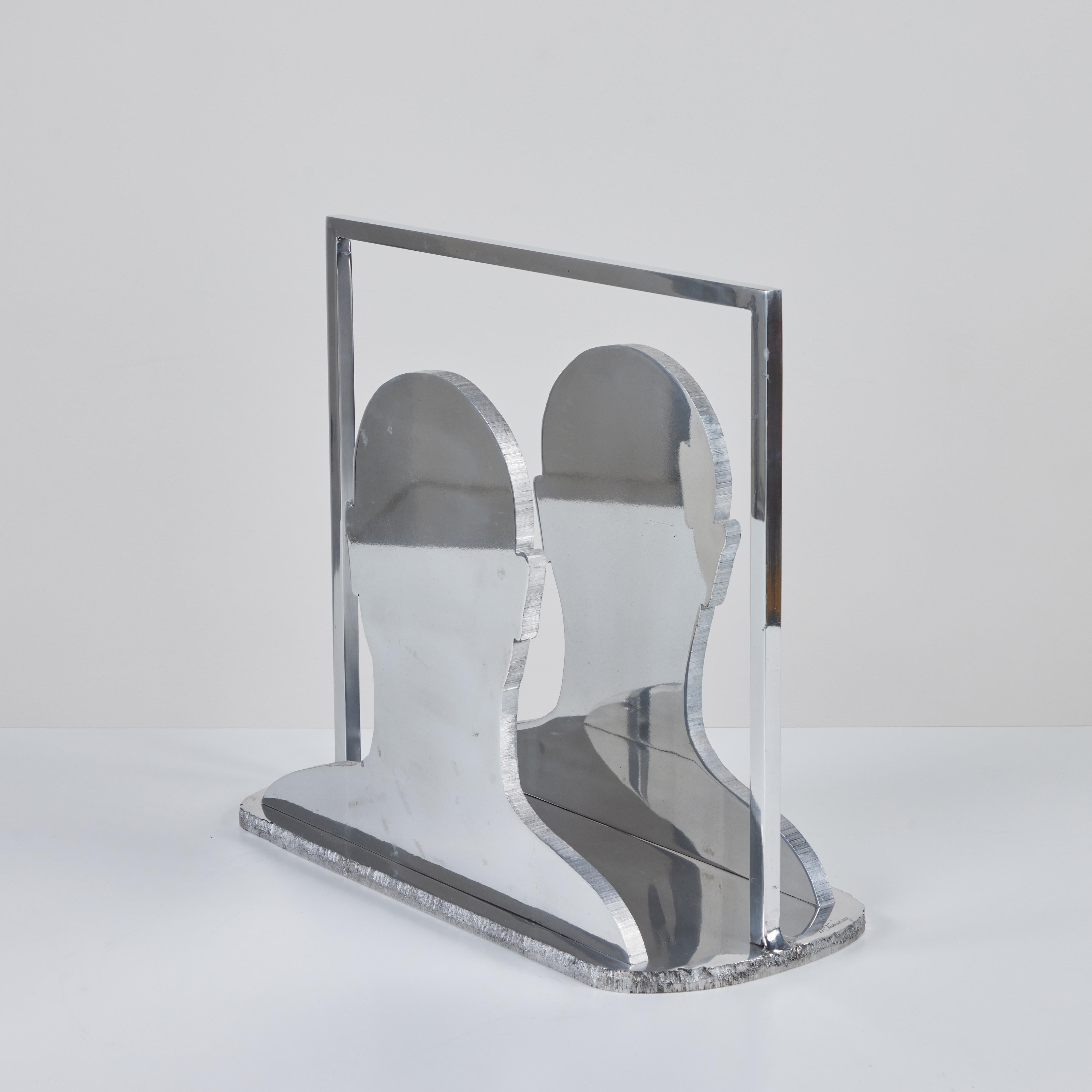Aluminum Silhouette Magazine Rack In Good Condition For Sale In Los Angeles, CA