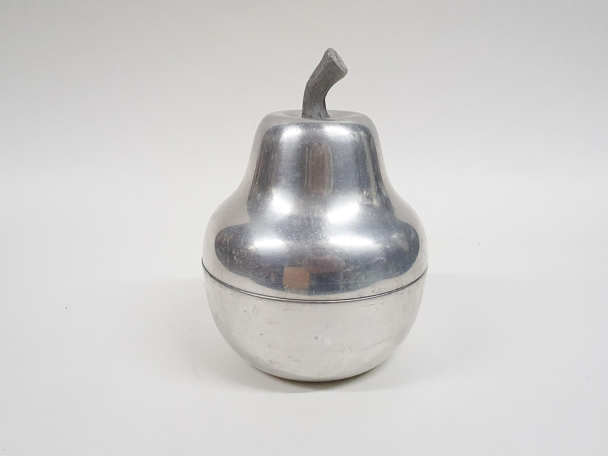 Vintage ice bucket in the shape of a pear with plastic interior.