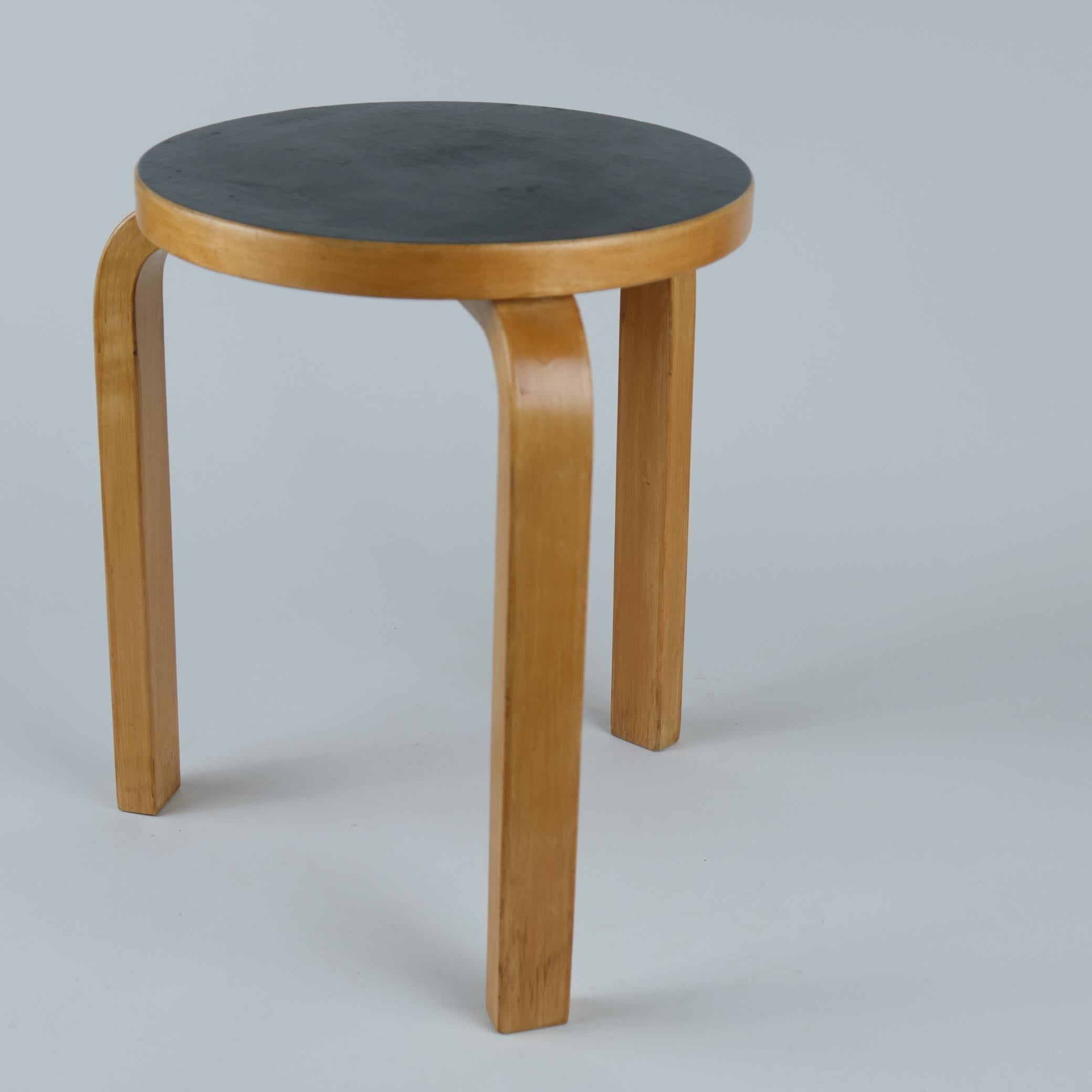 Artek stool in birch and black linoleum, designed by Alvar Aalto and manufactured by Artek in the 1950s. The model 60 stool is perhaps the most well known Aalto design and has always been attractive to people. As with a lot of Alvar Aalto's works 