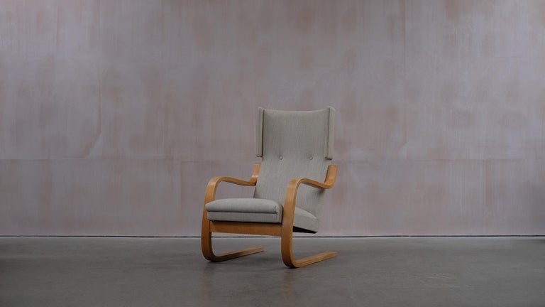 Early Alvar Aalto 36/401 chair designed in 1933 and made by O.y. Huonekalu – Ja Rakennustyotehdas AB, Turku, Finland. Beautiful example of this special chair with honeyed timber frames with perfect patina. Fully refurbished seat and back with new