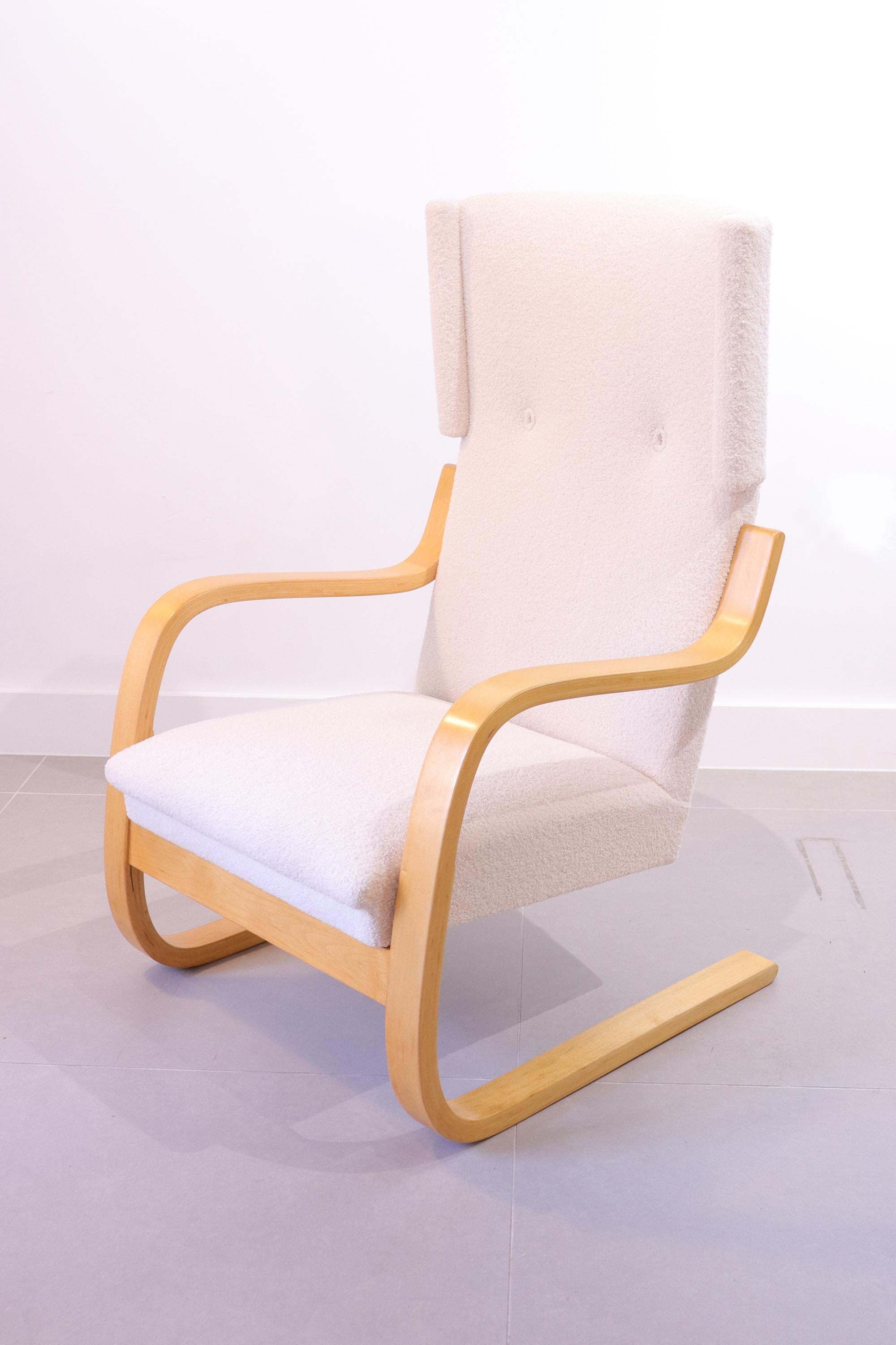 Alvar Aalto 401 wingback chair by Artek Finland, 1970s.
Bent birch and plywood frame, recently reupholstered in a high quality cream boucle.

About the designer: 
As one of the key figures of Mid-Century Modernism and perhaps Finland's most