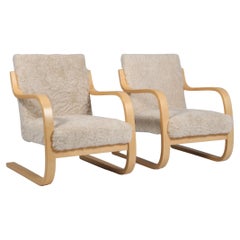 Paire de la série Alvar Aalto 402 Fauteuil en cuir d'agneau d'Artek pour Artek, vers 1960