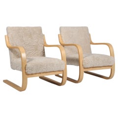 Alvar Aalto 402 Series pair of  Armchair for Artek, circa 1960, lambskin