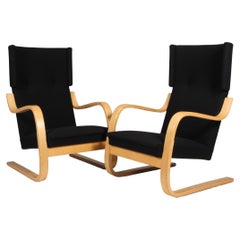 Alvar Aalto 402 Series pair of  wingback chairs for Artek, circa 1960,