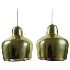 Alvar Aalto, a Vintage Pair "Golden Bell" Pendants, Louis Poulsen, 1960s