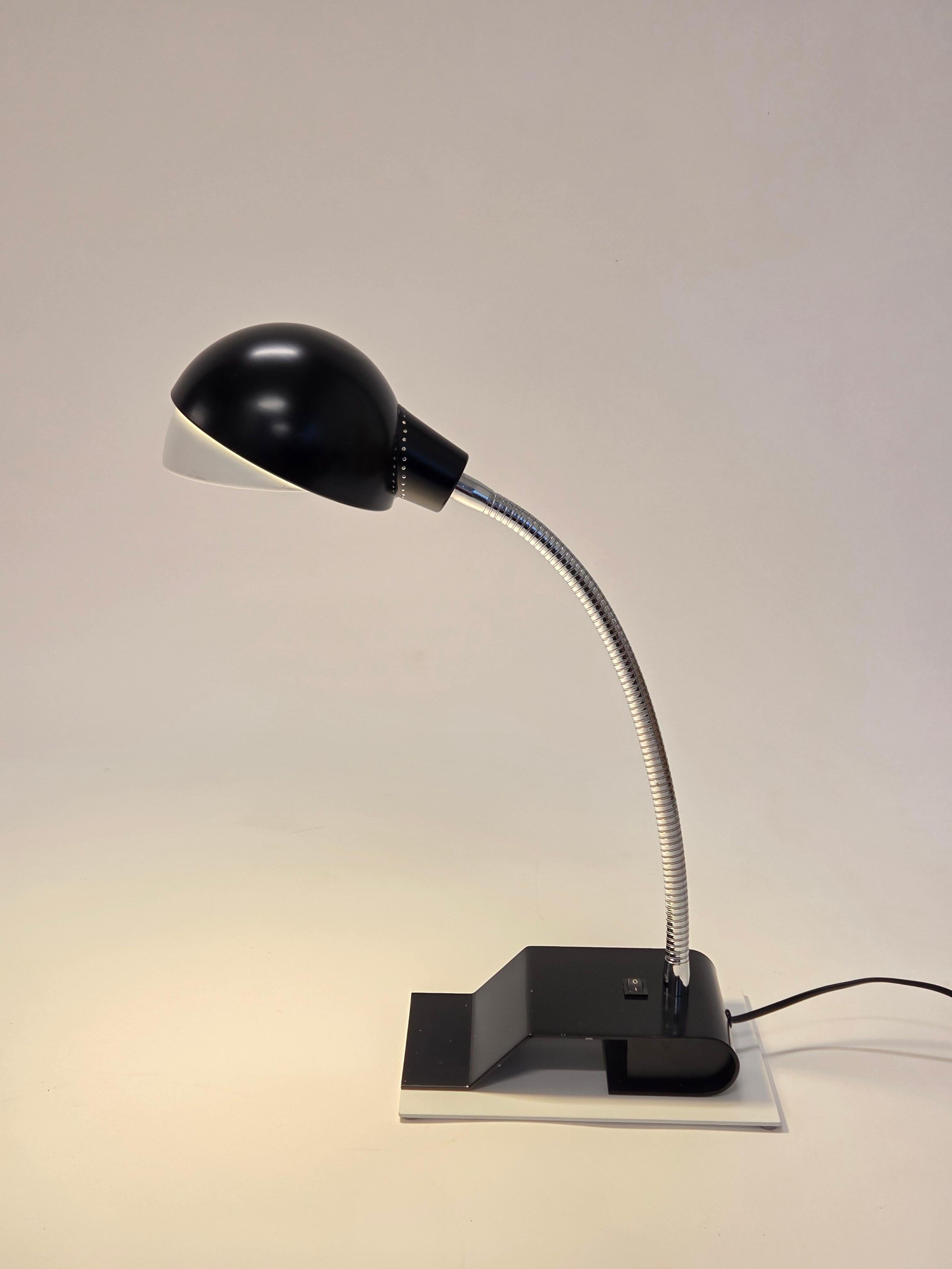 Artek's model A703 table lamp, designed by Alvar Aalto. In very good used condition.