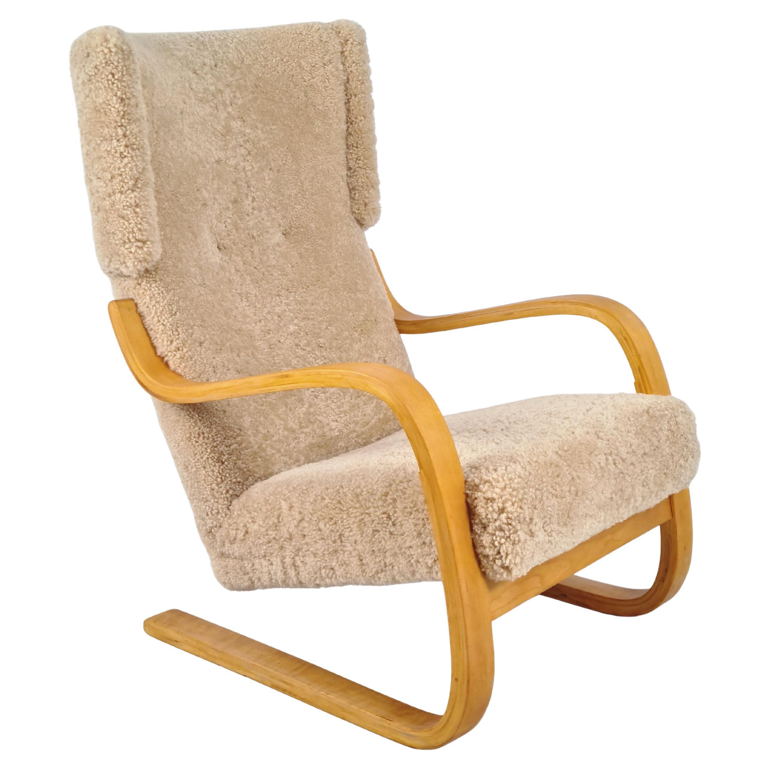 Sillón Alvar Aalto Model 401 en abedul y piel de oveja miel, Artek Años 50