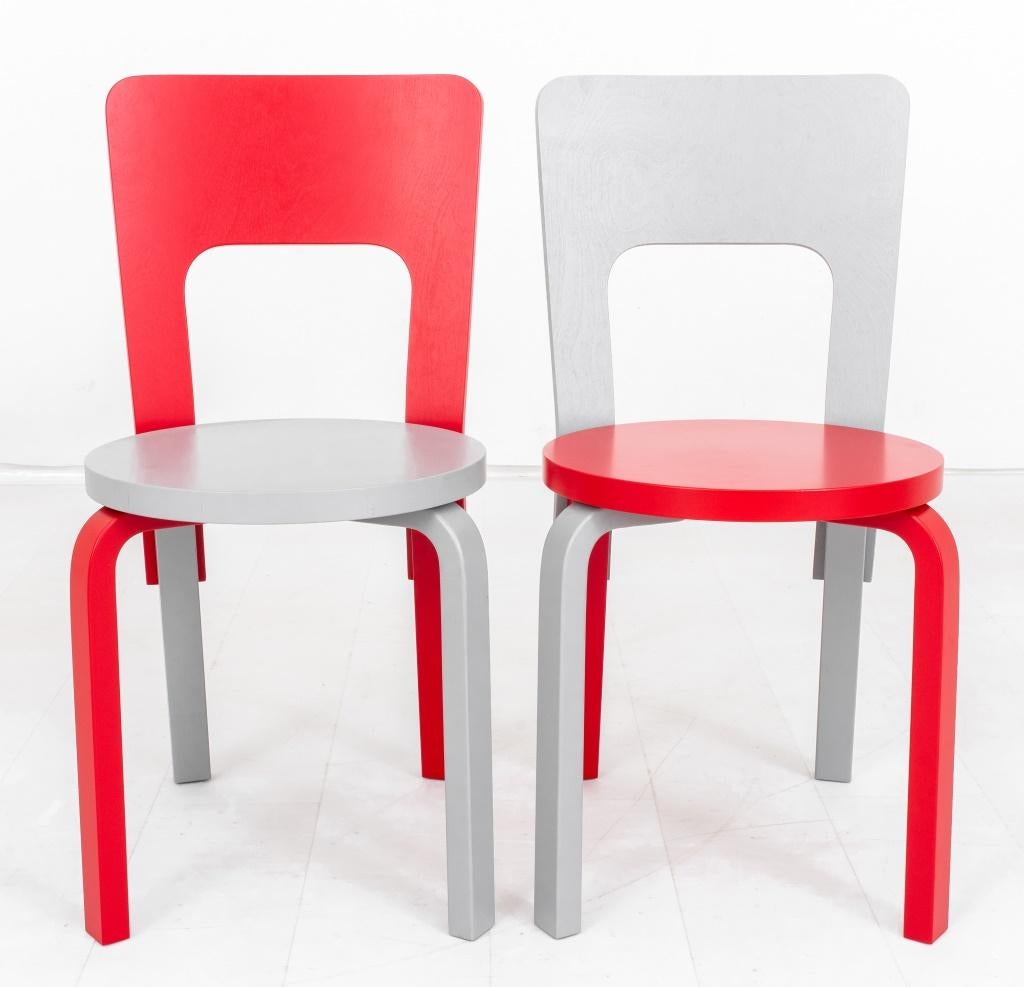 Alvar Aalto (Finish, 1898 - 1976) for Artek Mid-Century Modern pair of Model 66 chairs in red and gray color scheme, made in 2011 after the original from 1935, marked on bottom. Sold as pair. 

Dealer: S138XX