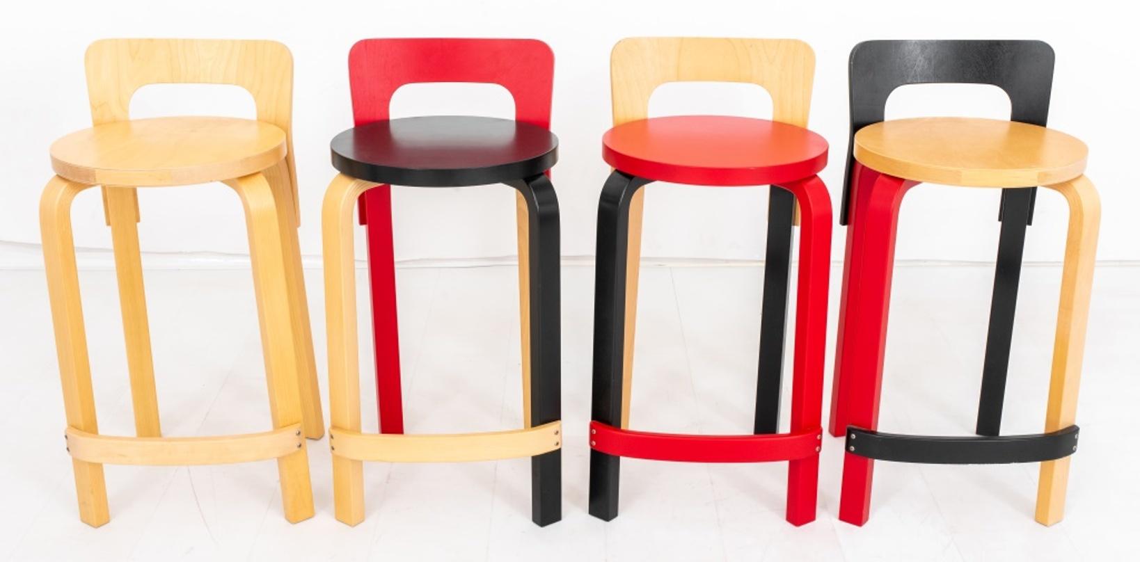 Alvar Aalto (Finish, 1898 - 1976) for Artek Mid-Century Modern set of four low back high chairs or stools in natural wood, red and black color scheme, made in 2011 and 2015, marked on bottom.

Dimensions: 28