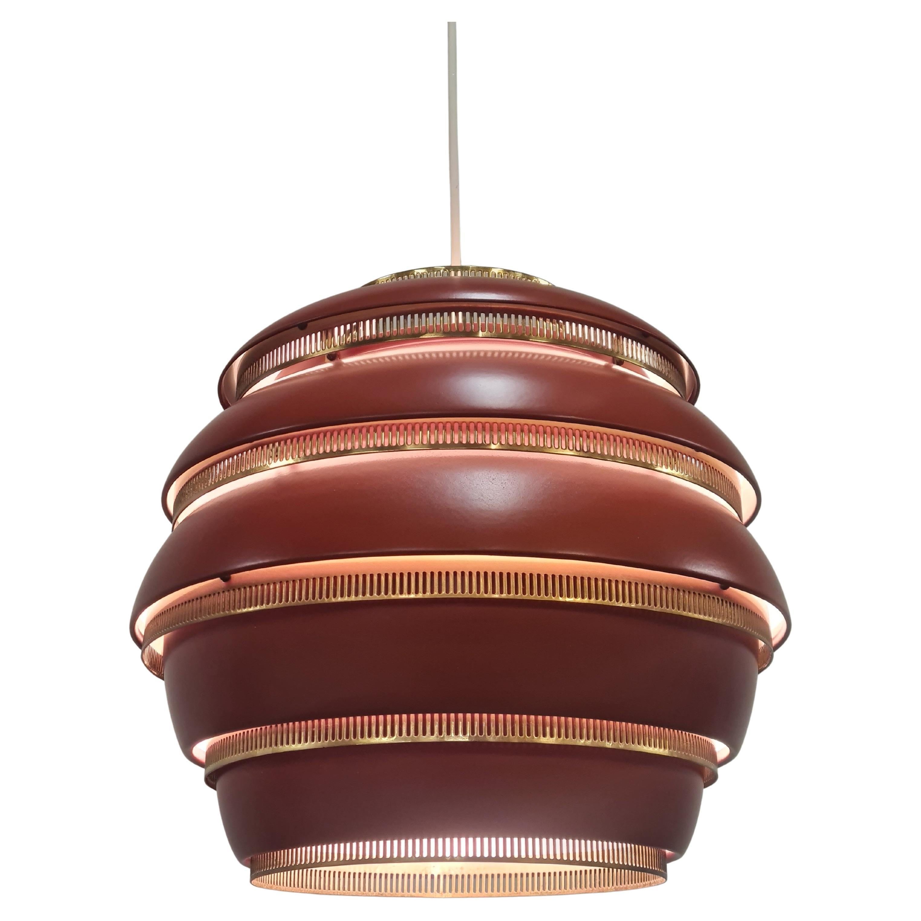This is one of Alvar Aalto's most iconic lighting designs. It was first designed in 1953. The design is incredibly simple and takes from nature as it mimics the hanging beehives on a tree. This lamp almost feels like its weightless. The design was