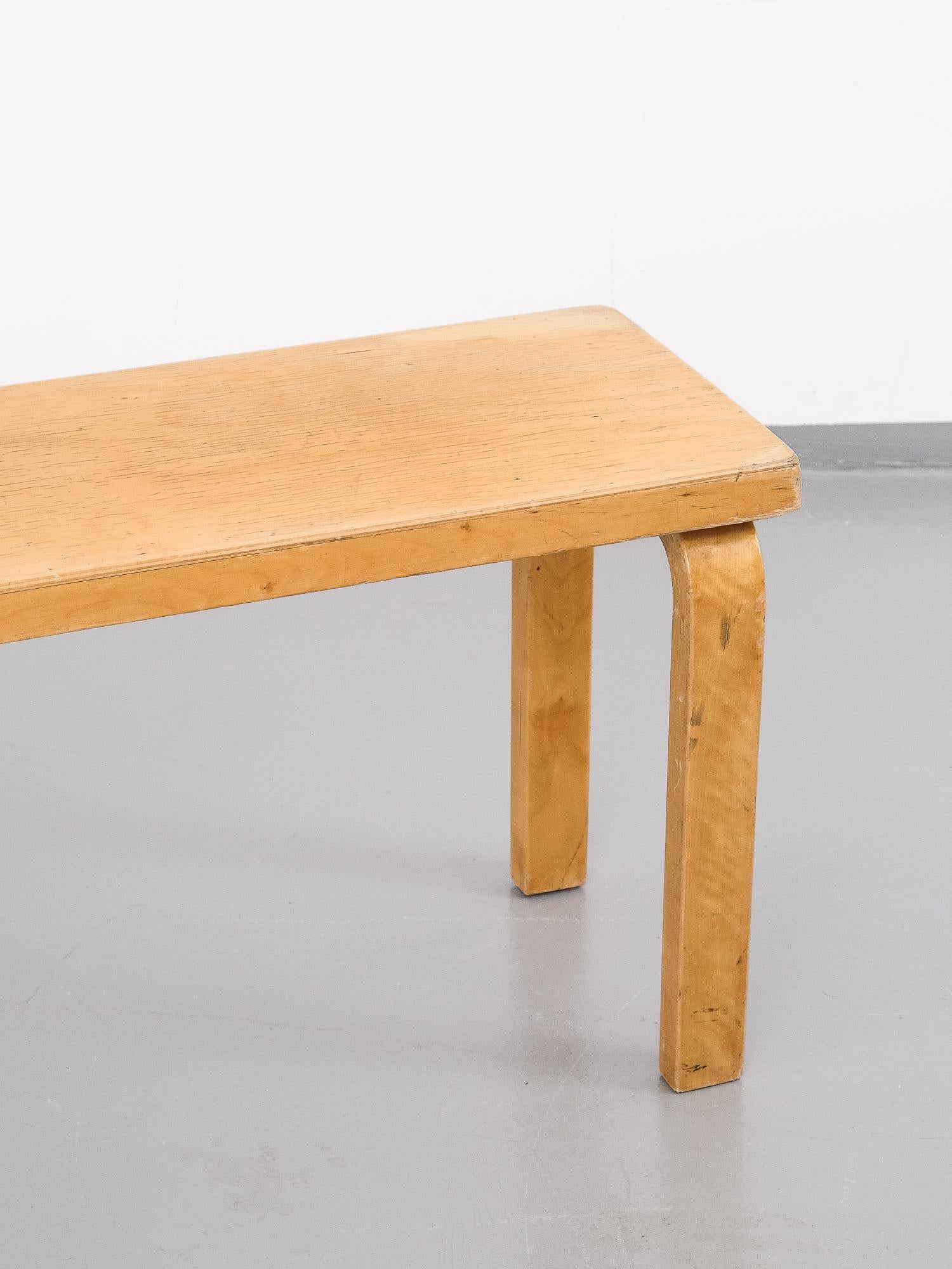 Rare customized bench designed by Alvar Aalto, Finland, circa 1950s. Comes from closed school, established in 1940s.