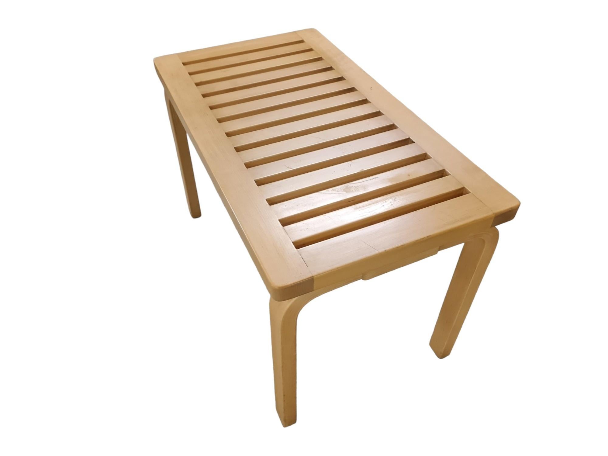 Iconic bench model 153 designed by Alvar Aalto and manufactured by Artek in the 1960s. The bench is in very good original condition.  As with a lot of Alvar Aalto's works  the beauty comes from the simplicity and functionalism. This plain bench has