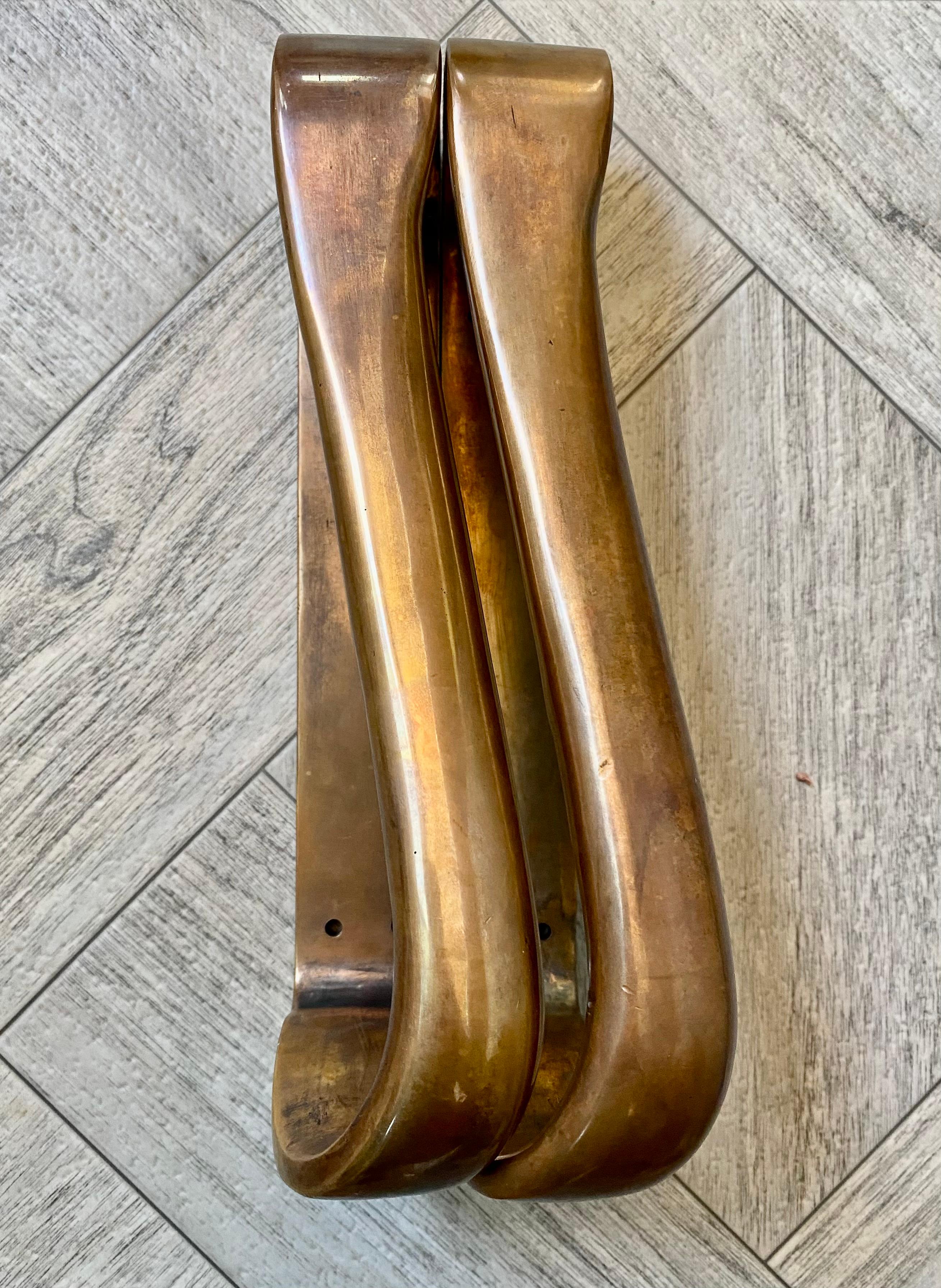 Alvar Aalto originally designed this door handle for the National Pensions Institute in Helsinki (1948-57) and, because it was such a successful form, reused in on many of his subsequent buildings. For Aalto the door handle was the building's