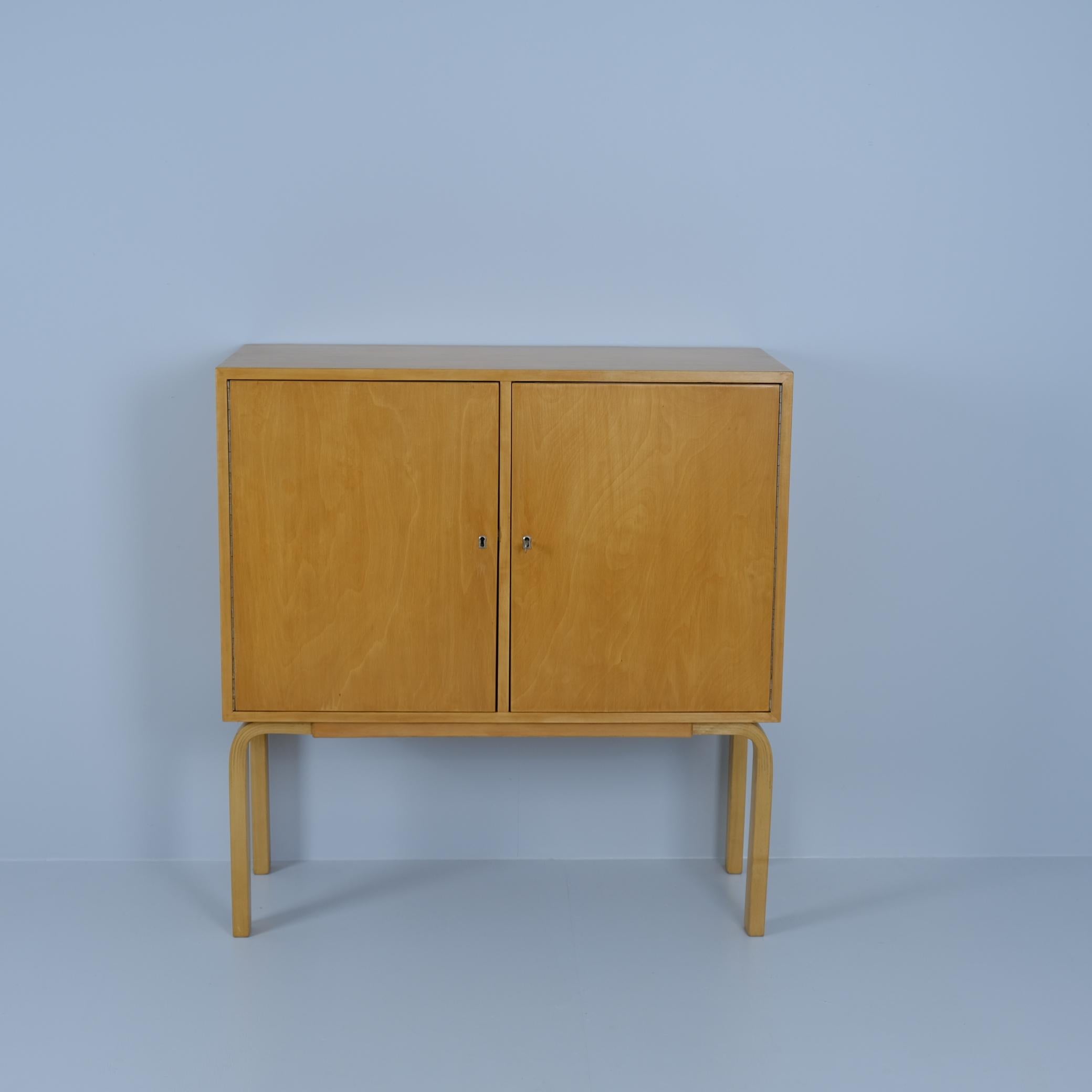A rare cabinet model 810 designed by Alvar Aalto and manufactured by Artek in Finland in the 1950s. Very minimal and sleek design, perfect for almost any interior. The item is in very good condition with some lite patina. 

All different versions of