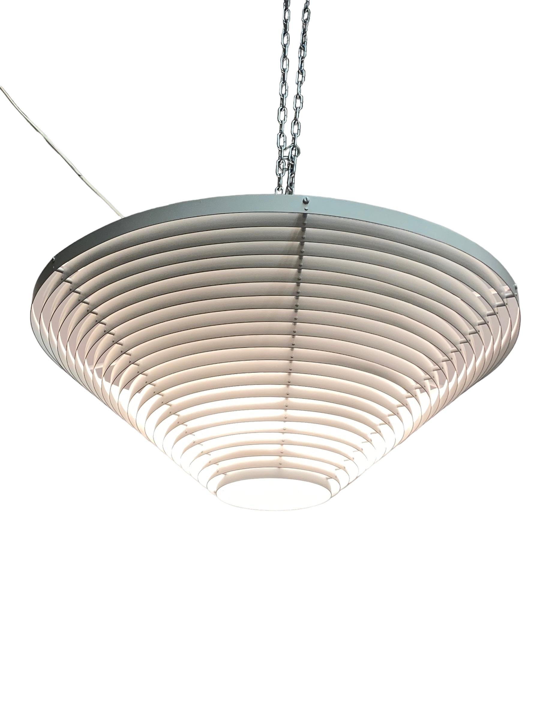 An iconic ceiling pendant model A622, designed by Alvar Aalto in the 1950s, and manufactured by Valaisinpaja Oy in Finland in the 1970s. In line with all Aalto furniture and lighting designs, this piece is very minimalistic and functional. The