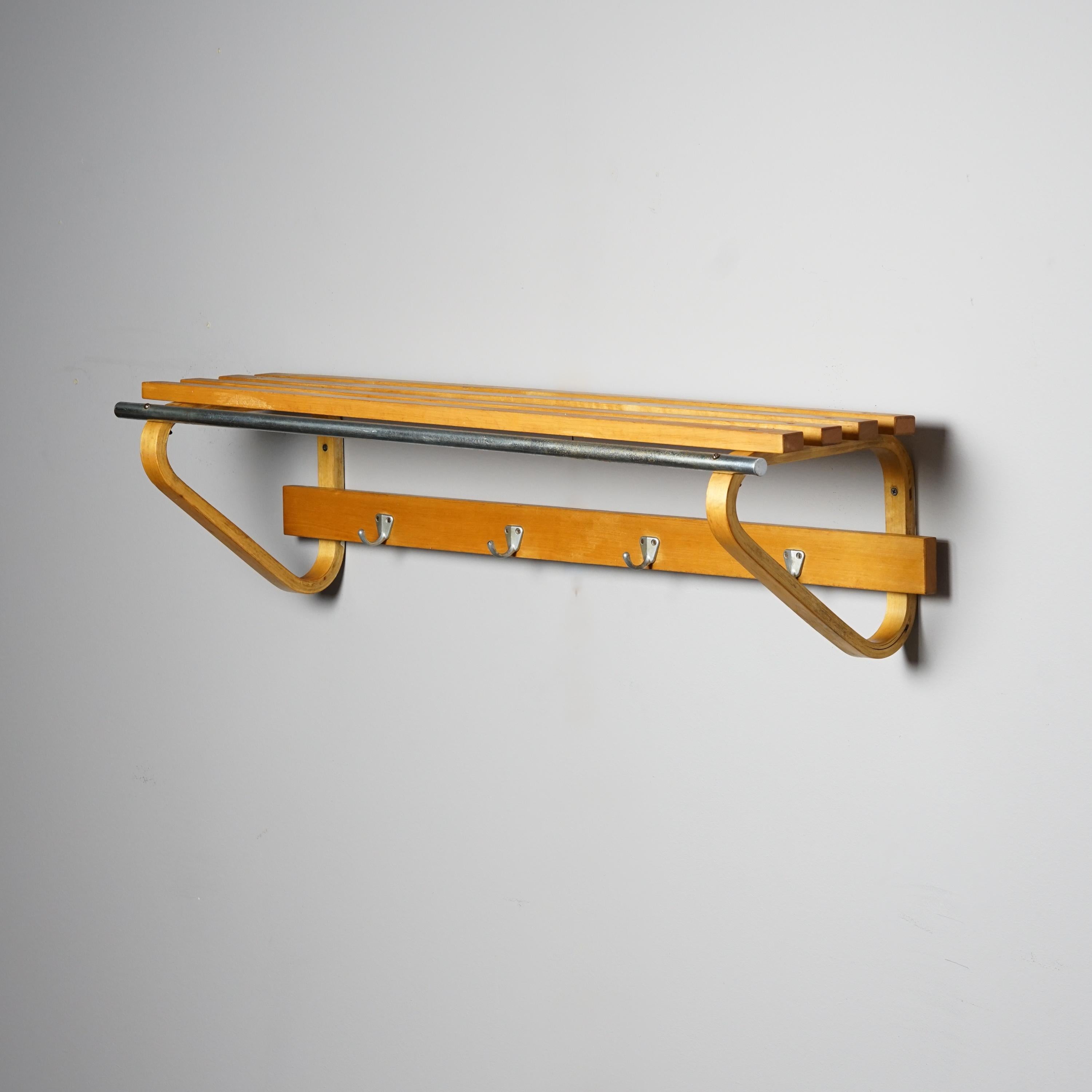 Alvar Aalto coat rack for Artek from the mid-1900s. Birch with metal details. Classic Alvar Aalto design. Good vintage condition, minor wear consistent with age and use.