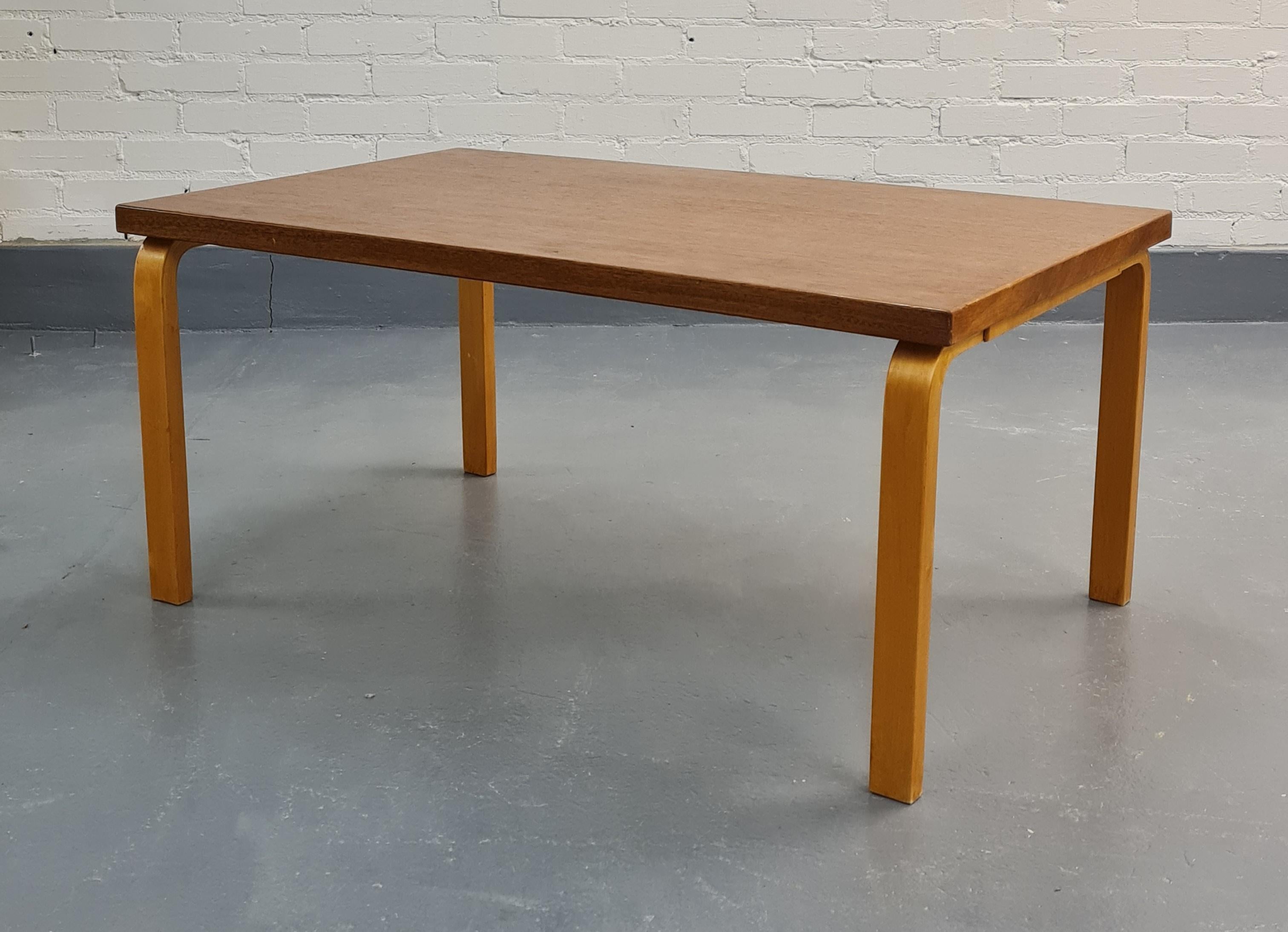 A classic Alvar Aalto coffee table in beautiful condition and patina. Even not the rarest of models this particular piece stands out from the rest, thanks to the excellent condition it has maintained and the beautiful dark patina it has gained