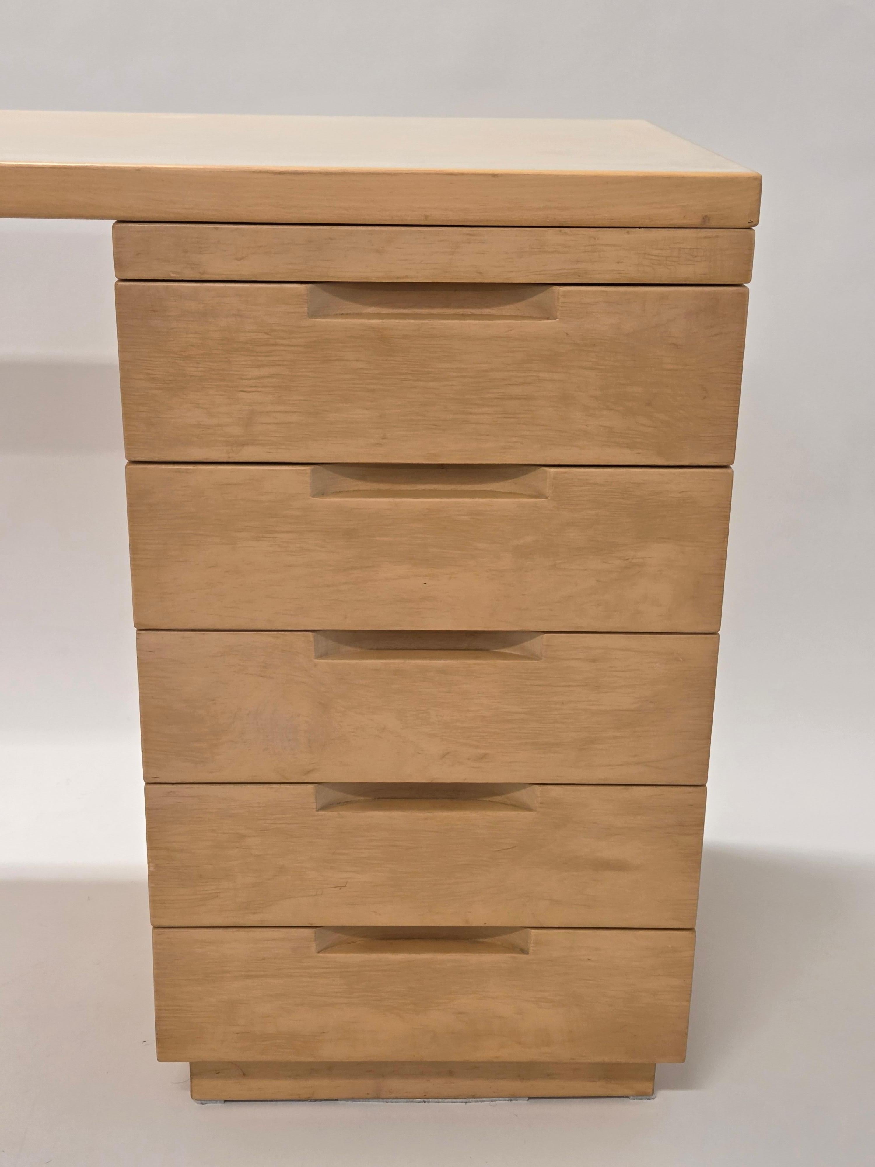 Artek writing table with drawers, birch with cream linoleum. The desk is from around the 1960s and in good used condition. Designer Alvar Aalto.
