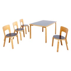 Alvar Aalto Dining Table and Four Chairs, circa 1970