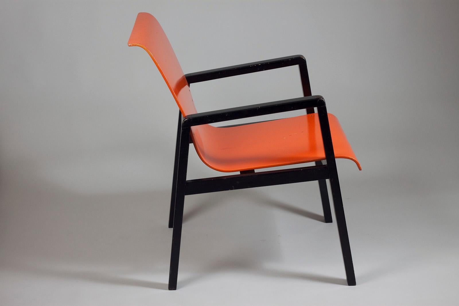 Alvar Aalto designed this chair in 1932 for the Paimio Sanatorium hospital for tuberculosis patients. The orange colour was used to reduce the blood pressure in the patients.