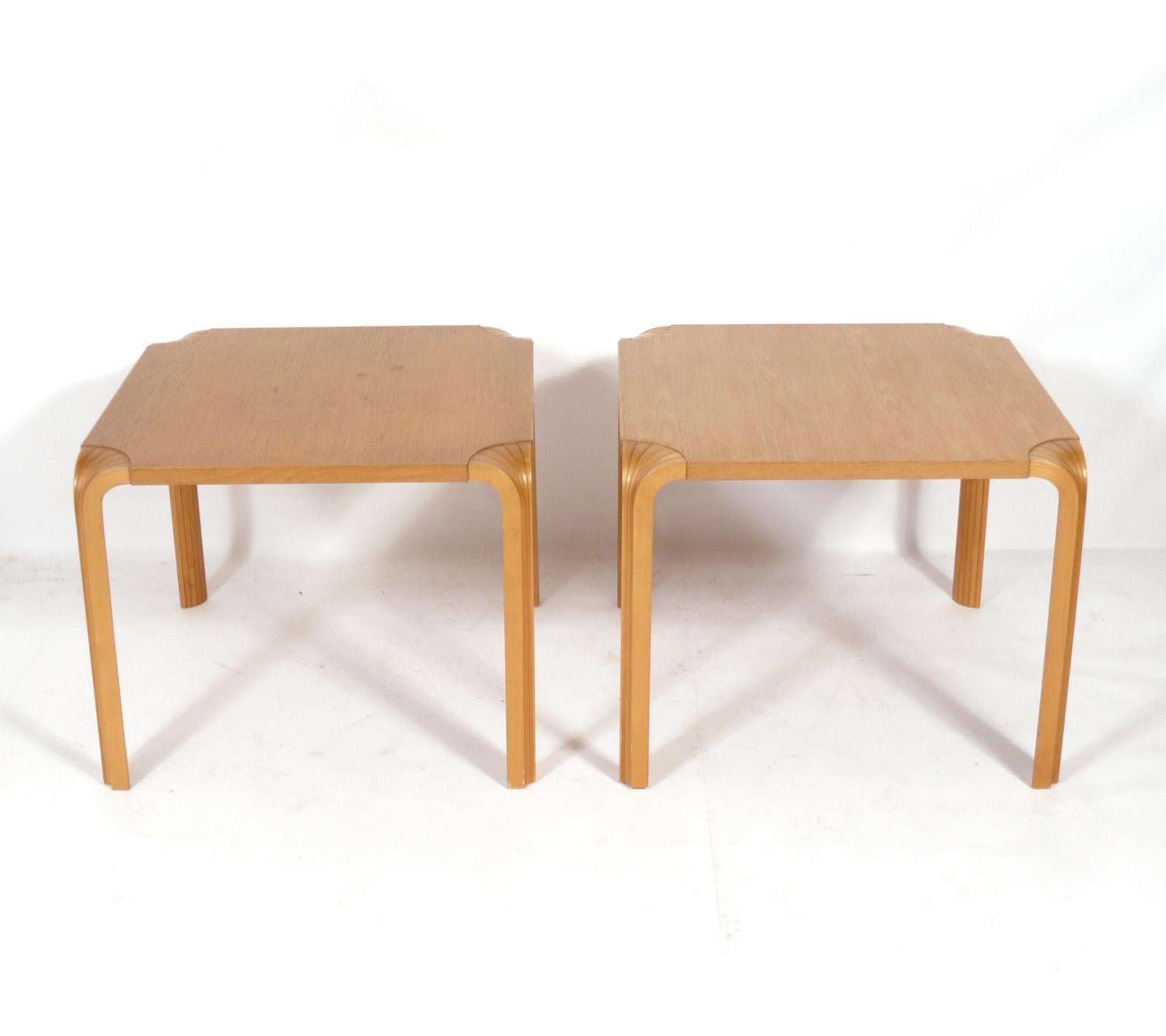 Pair of Alvar Aalto end tables, for Artek, Finland, circa 1980s. They retain their warm original patina. They are a versatile size and can be used as end or side tables, or as night stands.