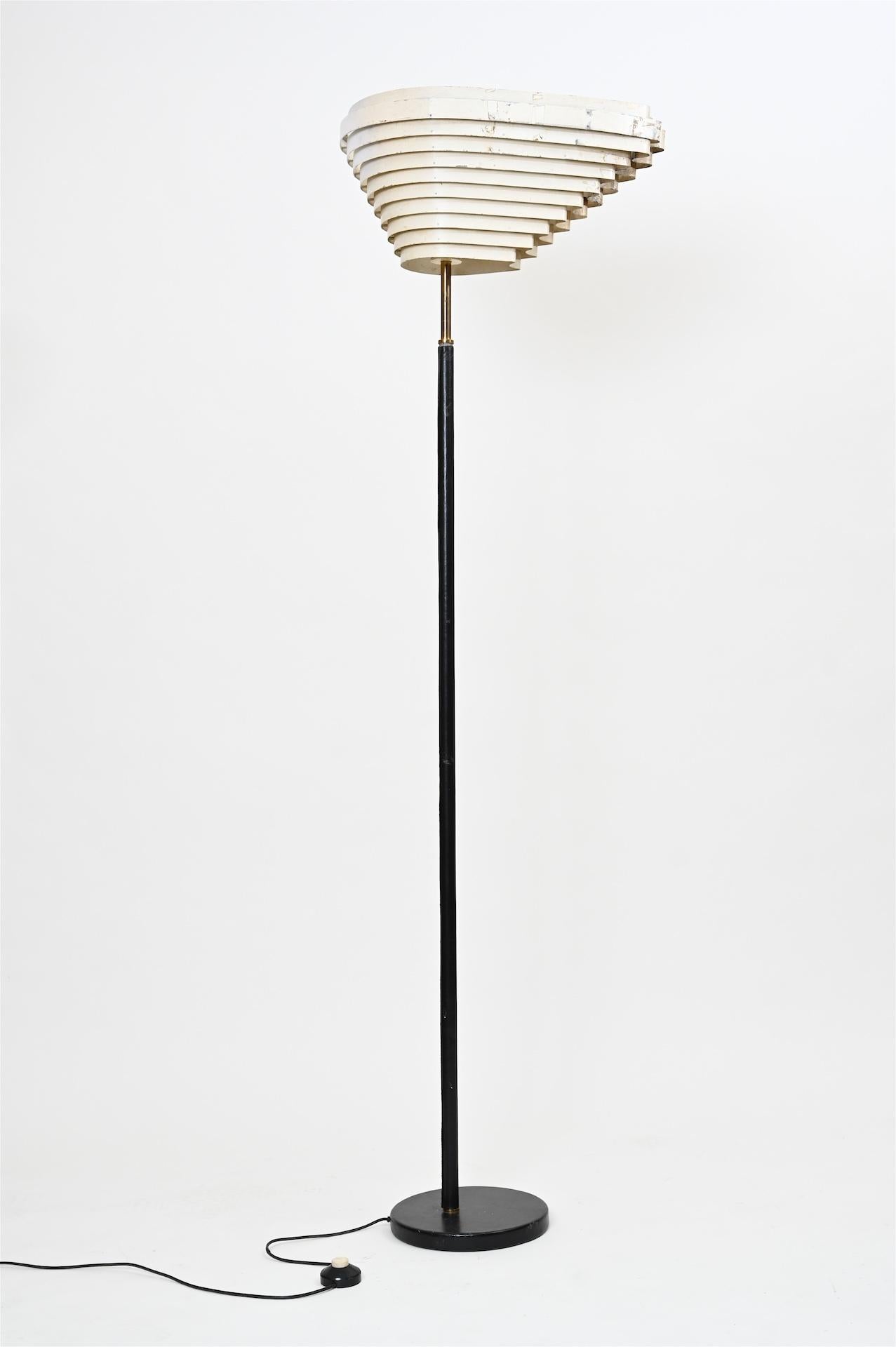 Original and rare floor lamp. Model A805, 'Angel Wing', designed by Alvar Aalto. 

Produced by Valaistustyö in Finland circa 1954

Light has been rewired. Is in original 1950s condition with some historic restorations to shade. (most of shade