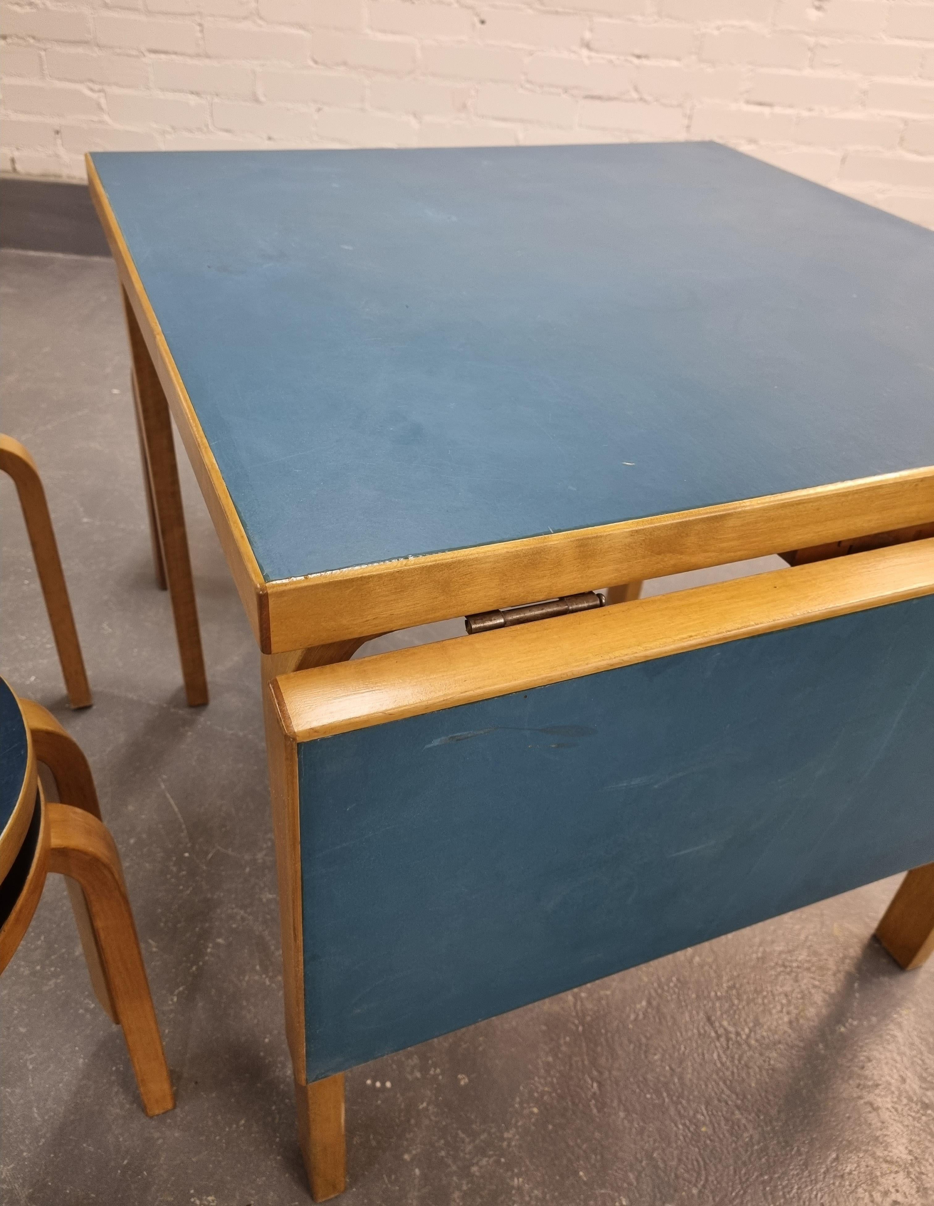 Finnish Alvar Aalto Foldable Table and 6 Stools, Artek