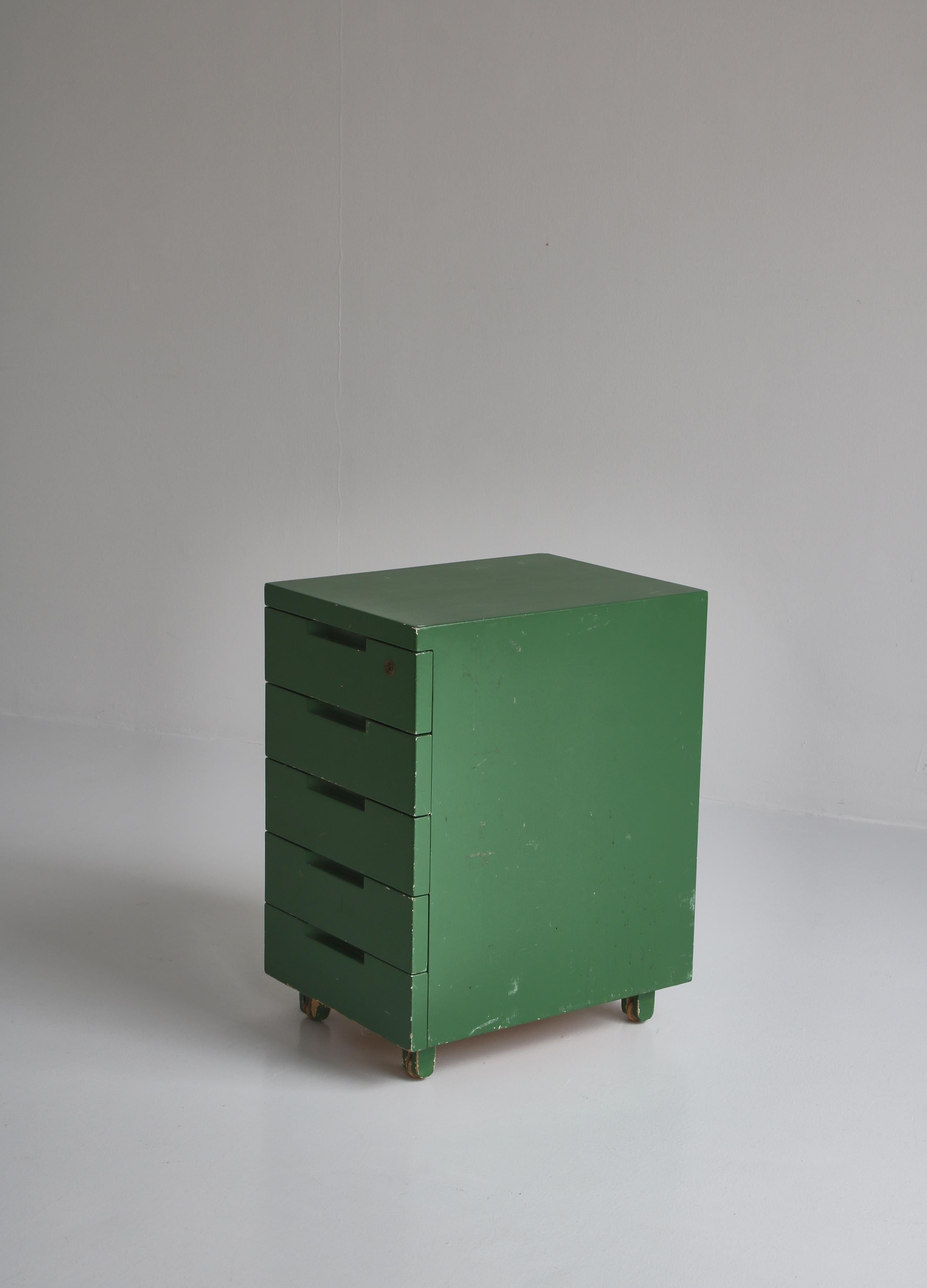 dark green filing cabinet