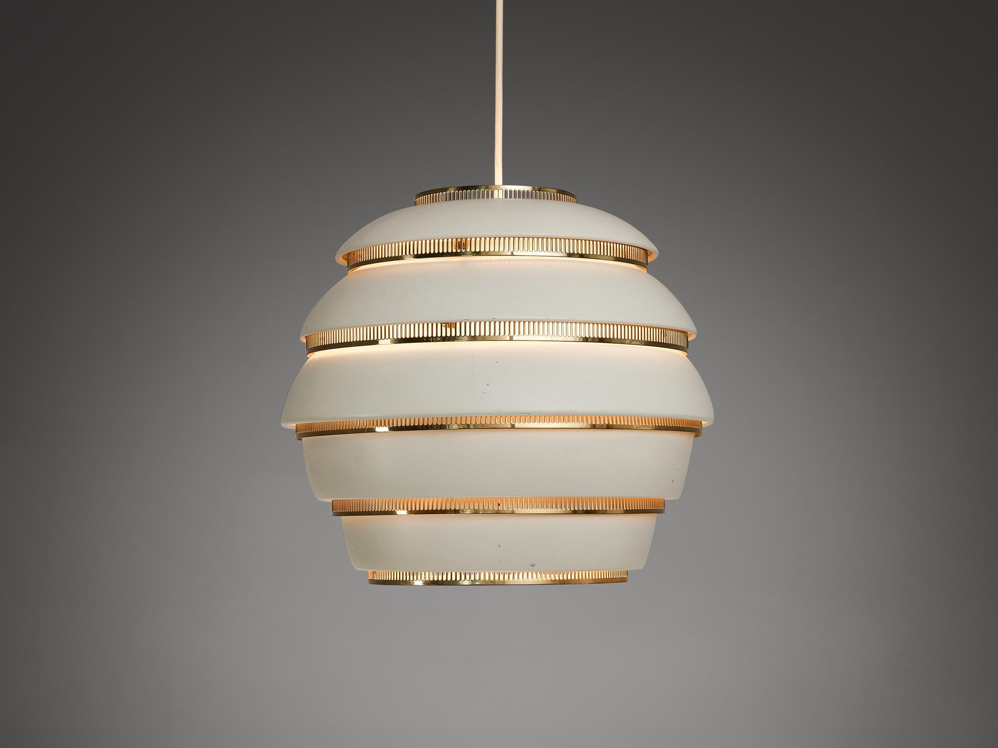 Alvar Aalto for Valaisinpaja Oy, pendant lamp 'Beehive' model A331, metal, brass, Finland, 1953.

The pendant lamp model A331 by Alvar Aalto carries the nickname 'Beehive' since its shape awakes the association of a structure built by bees. Five