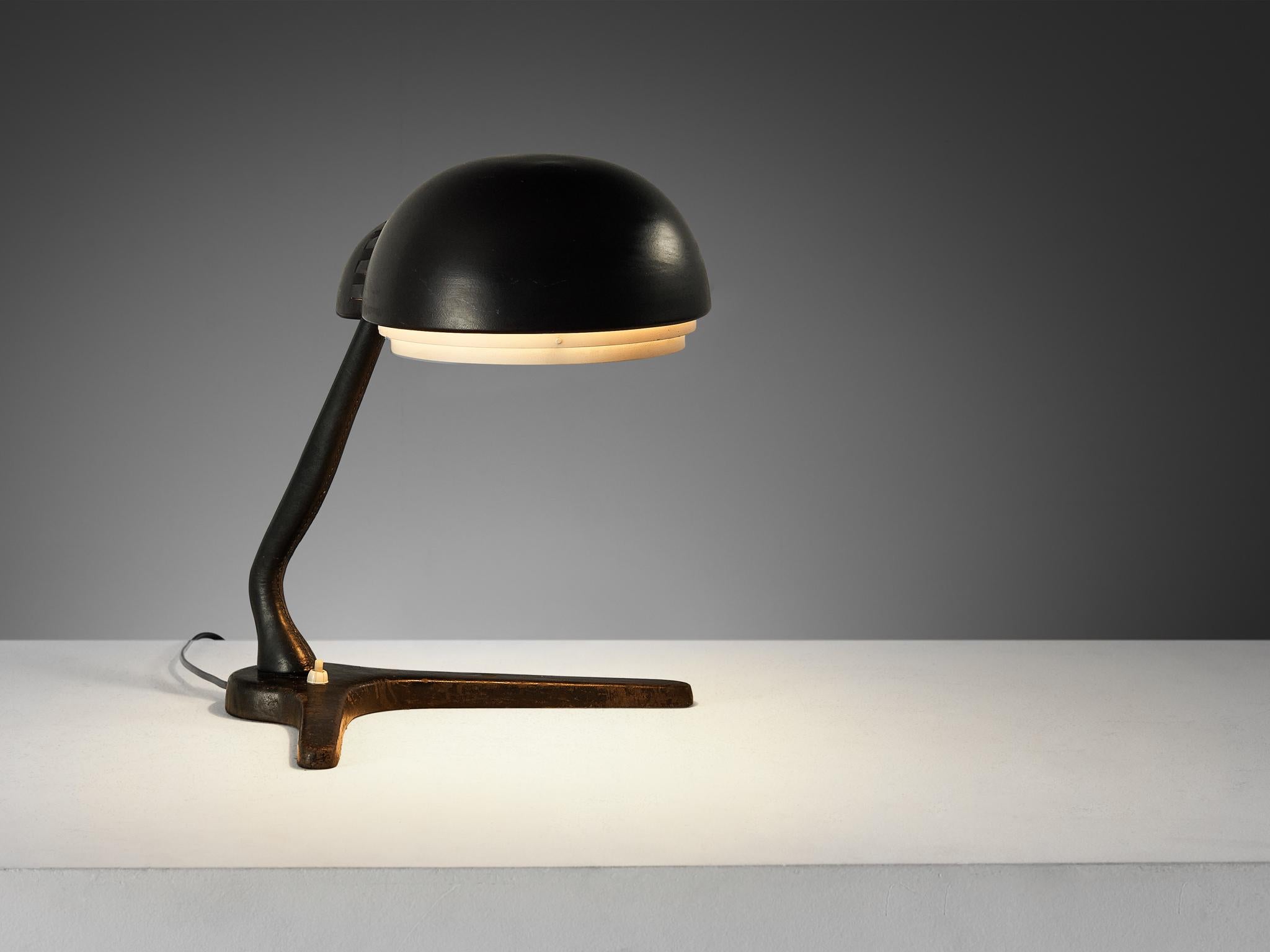 Alvar Aalto for Valaistustyö Ky, desk lamp, model ‘A704’, enameled steel, enameled aluminum, leather-bound metal, Finland, 1954 
 
This table lamp model ‘A704’ is designed by Finnish modernist architect and industrial designer Alvar Aalto for