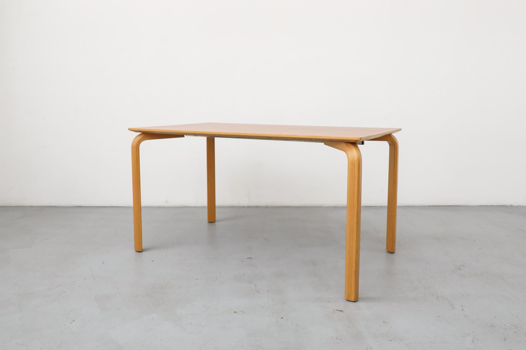 Alvar Aalto desk or dining table designed with rectangular tables with bentwood legs. In original condition with four individual legs and beveled table top. Wear is consistent with age and use. Condition may vary, 8 currently available, sold
