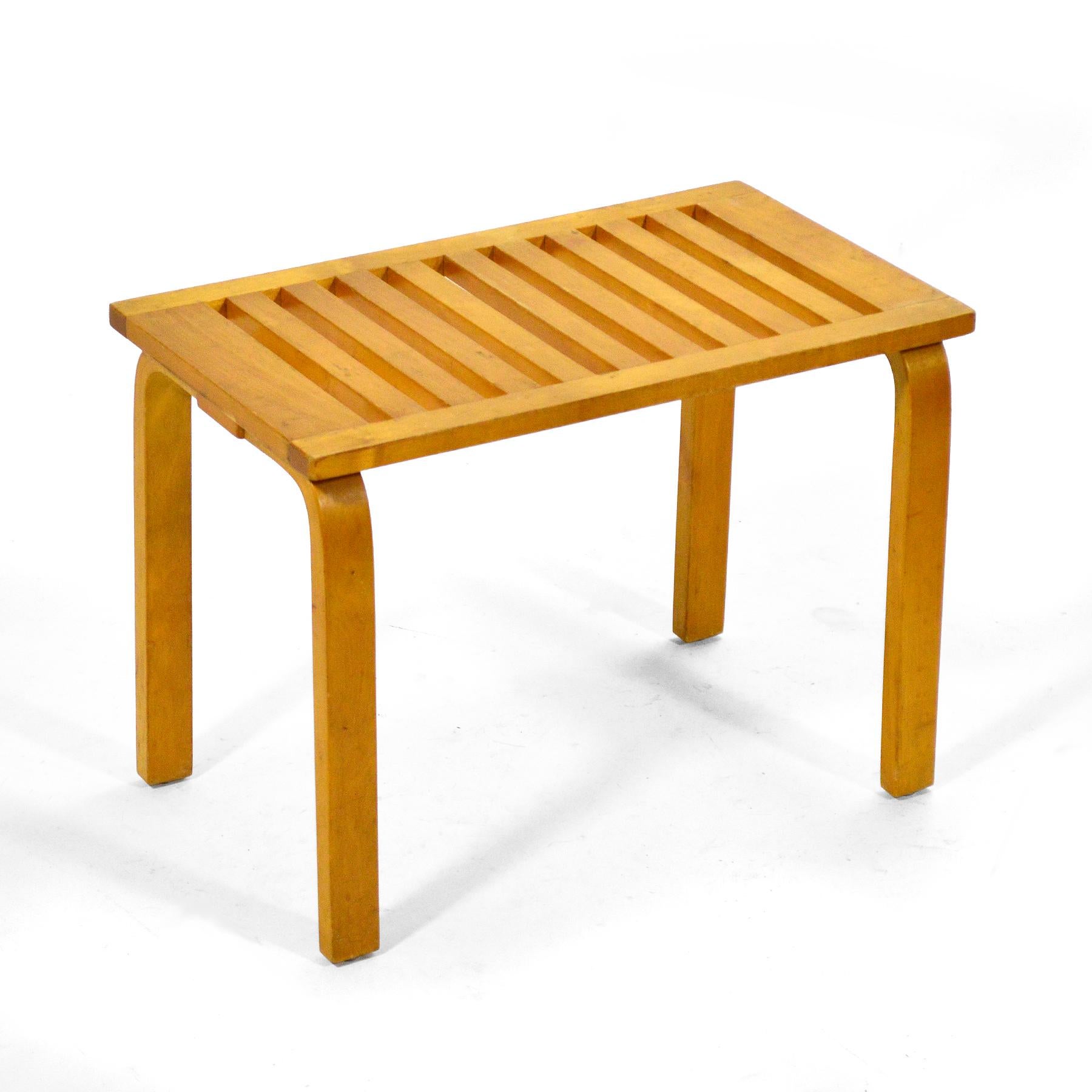 This exceptional example of Allto's slat bench/ table by Artek dates to circa 1948 and was sold at Chicago's landmark modern design store Baldwin Kingrey. It has a beautiful patina from age and retains its original label on the underside.