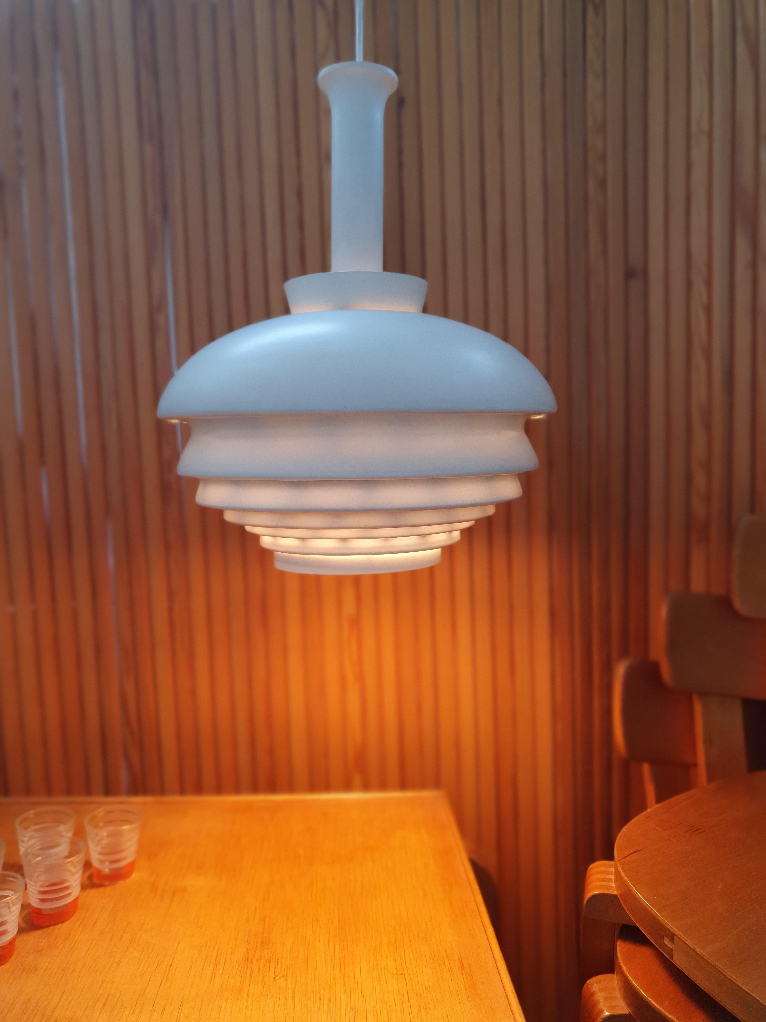 Artek A622A lamp, designed by Alvar Aalto and manufactured by Valaistustyö Ky. The lamp is in very good used condition. Valaistustyö's stamp on the lamp.

The Artek A335A pendant lamp, designed by renowned Finnish architect Alvar Aalto, is a