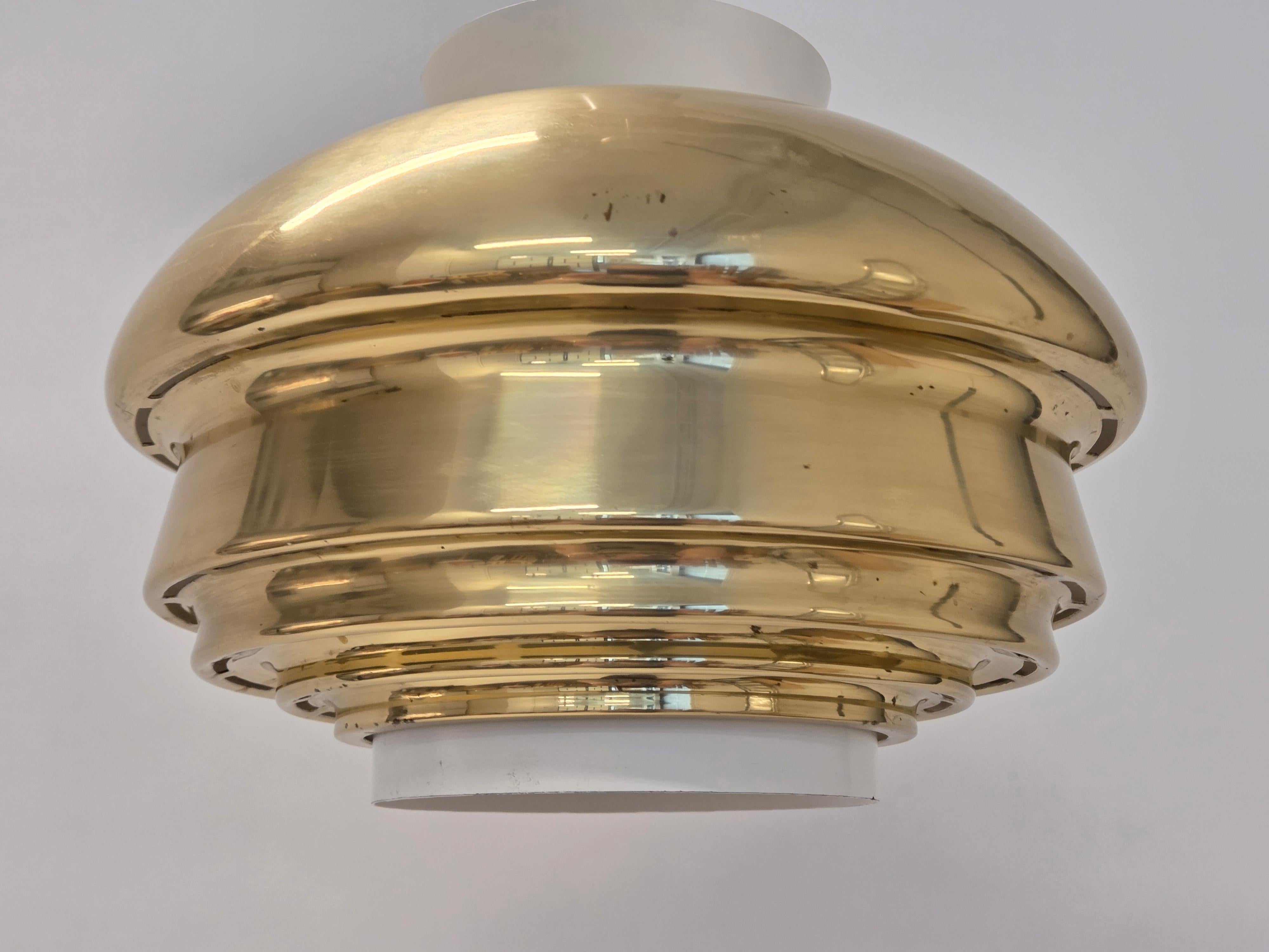 Artek A335B lamp, designed by Alvar Aalto and manufactured by Valaistustyö Ky. The lamp is in very good used condition. Valaistustyö's stamp on the lamp.

The Artek A335B pendant lamp, designed by renowned Finnish architect Alvar Aalto, is a