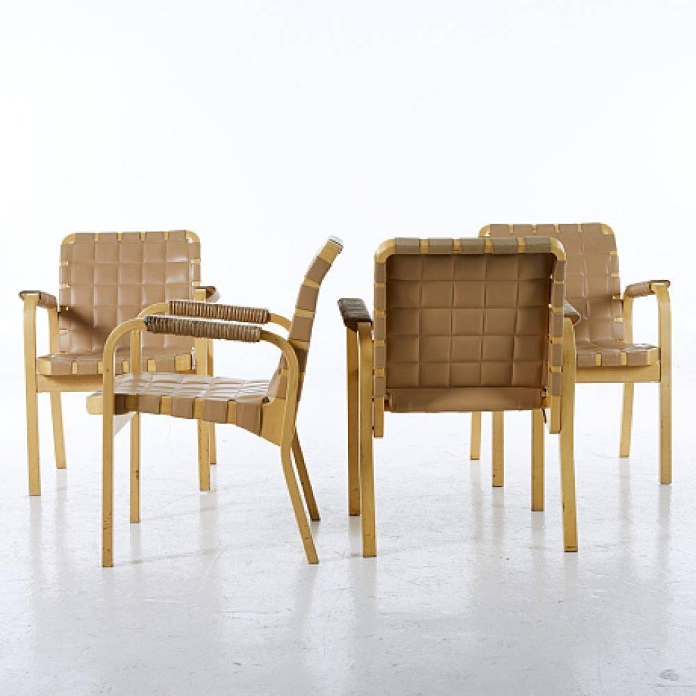 Alvar Aalto, 4 chairs , “NV45”, Artek, Finland, birch, leather armrests, leather seat and back, width 59 cm, seat height approx. 42 cm. Stains, wear 