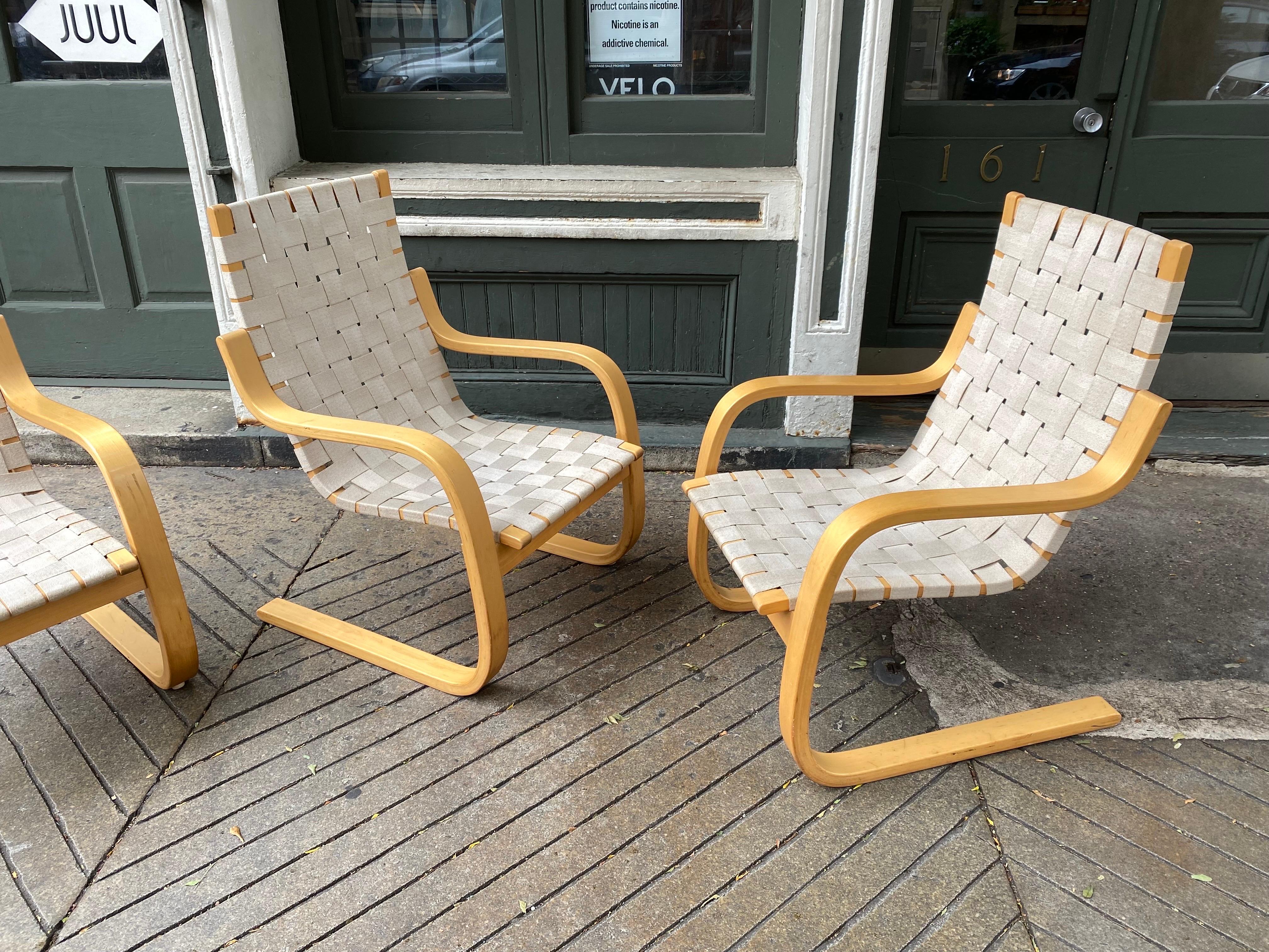 Alvar Aalto lounge Chairs, model 406. 2  Chairs  Available.  Chairs were at a Beach House so not heavily used.  Wood is very nice and straps show minimal wear.  Table available in a separate listing.  ICF label to underside.