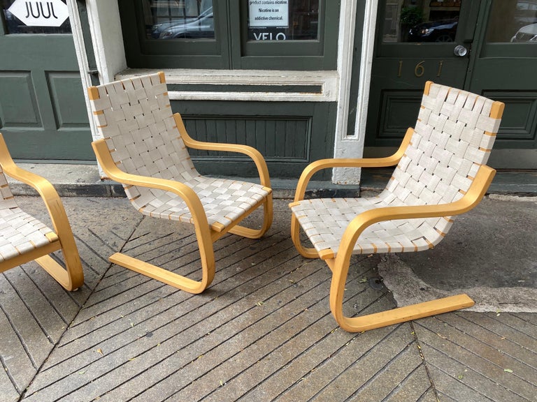 Alvar Aalto lounge Chairs, model 406.  3 Chairs Available.  Chairs were at a Beach House so not heavily used.  Wood is very nice and straps show minimal wear.  Table available in a separate listing.  ICF label to underside.