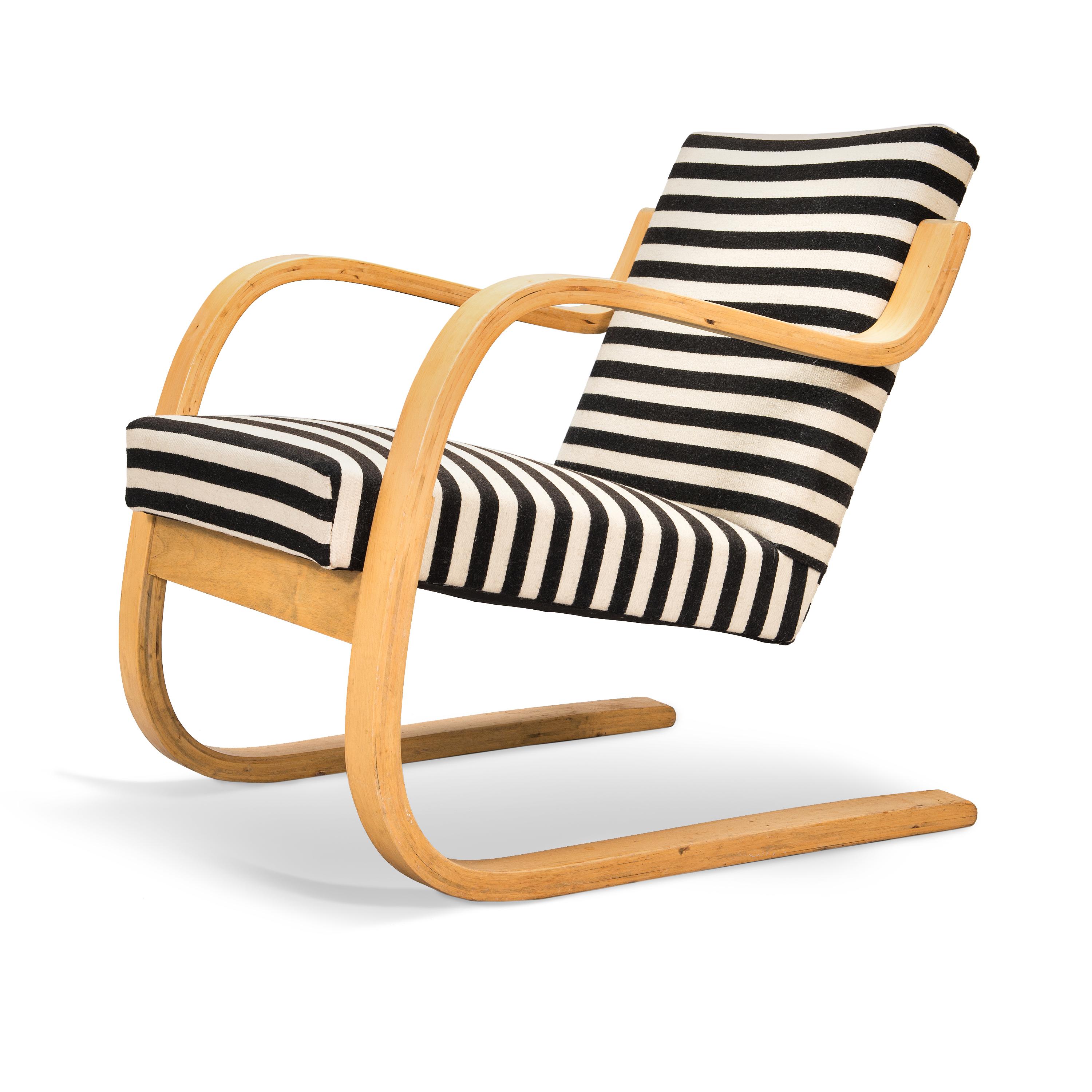 Finnish architect and designer Alvar Aalto '34/402' armchair for O.Y. Huonekalu- ja Rakennustyötehdas A.B. Finland. Designed in 1933 and likely produced in the 1960's. Frame is made from laminated birch. Upholstered in a striped wool blend fabric,