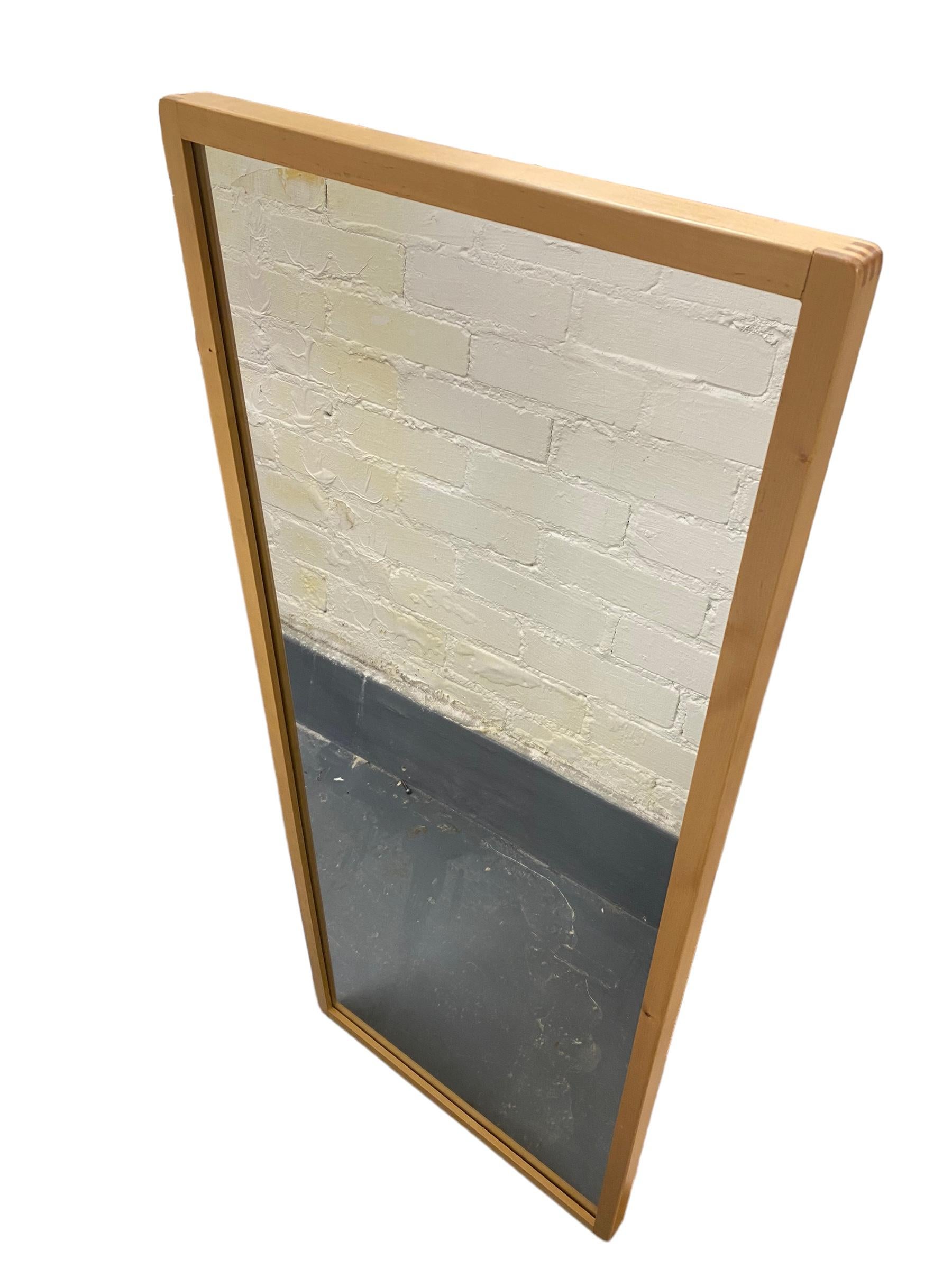 An iconic mirror designed by Alvar Aalto and retailed by Artek in Finland.  We have seen this type mirror in schools, public buildings, kintergardens, restaurants, and you name it, and it´s there.  

This mirror makes a great addition to any space,