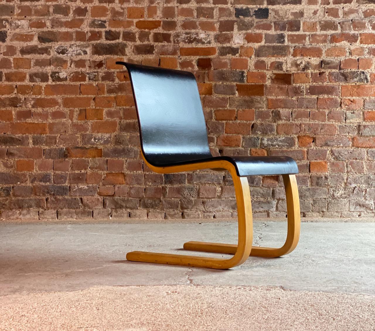 Alvar Aalto model 21 cantilever side chair by Finmar, Finland, circa 1940

Stunning original and highly sought after Alvar Aalto model 21 cantilever side chair for Finmar, Finland, circa 1934, bent laminated birch frame with moulded ebonized