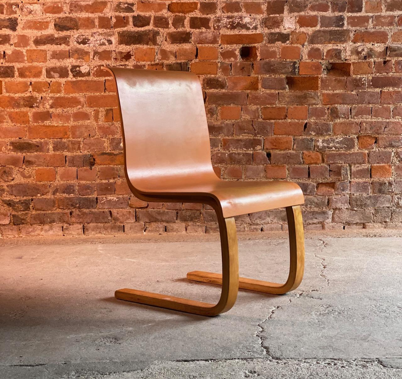 Alvar Aalto Model 21 Cantilever side chair by Finmar Finland circa 1935 Number 2

Stunning original and highly sought after Alvar Aalto Model 21 Cantilever side chair for Finmar Finland circa 1935, bent laminated birch frame with moulded Ornage